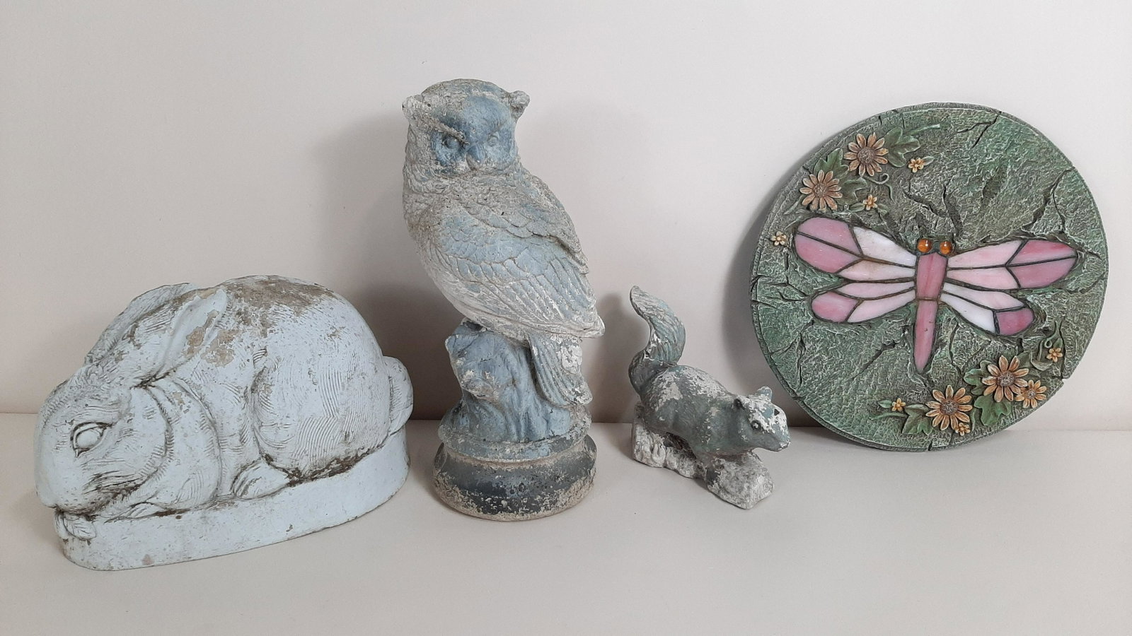 4 Lawn Ornaments: Includes concrete owl and squirrel. Repair to squirrel tail. 6" to 13" high. IMPORTANT: Before bidding, please read the terms and conditions. When you registered for the auction you agreed to these te
