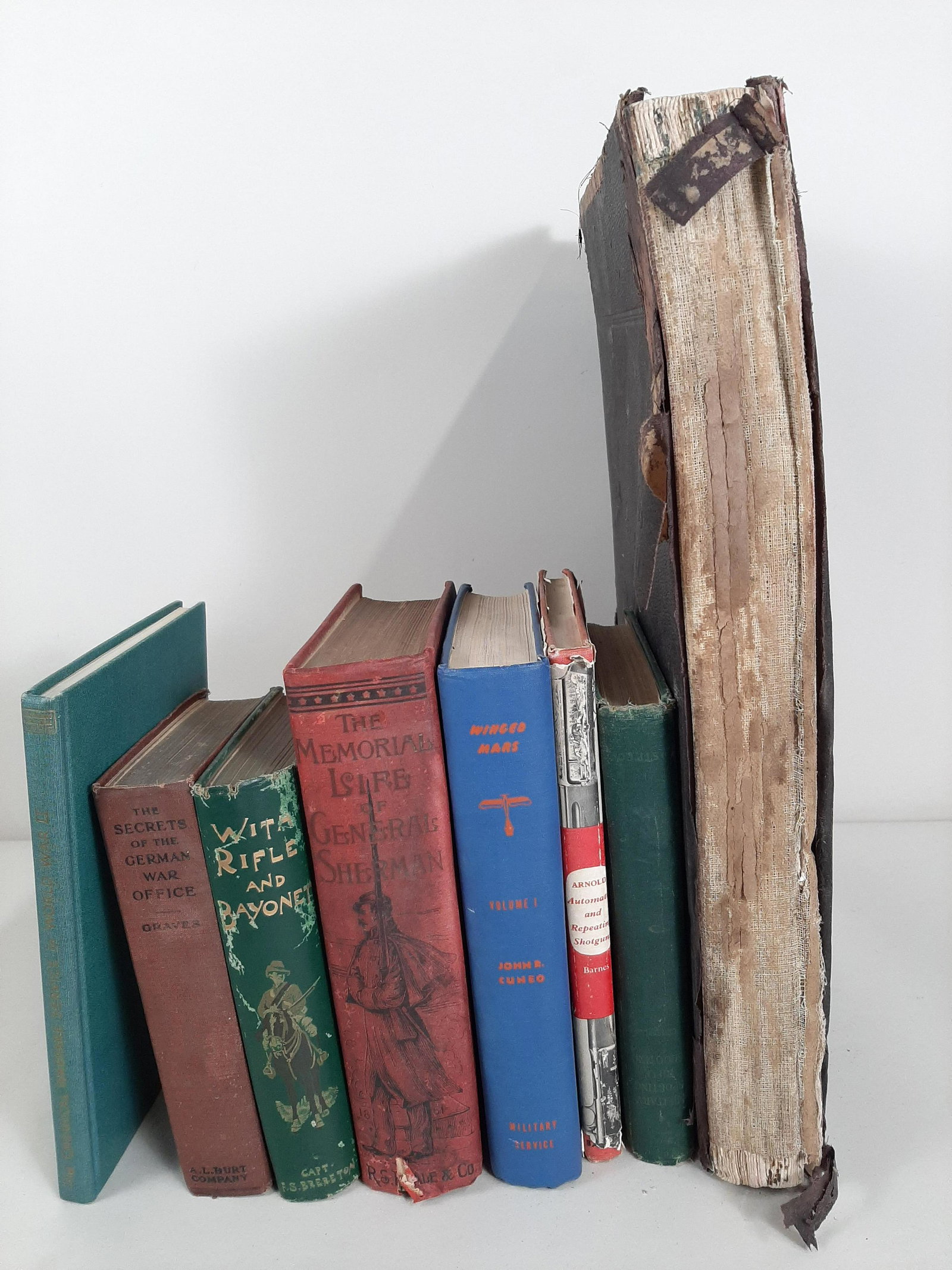 8 Books on War and Guns: Includes Winged Mars by John R. Cuneo (signed) 1942, Automatic and Repeating Shotguns by Richard Arnold 1962, Military and Sporting Rifle Shooting by Edward C. Crossman 1932, The Memorial Life of Gene