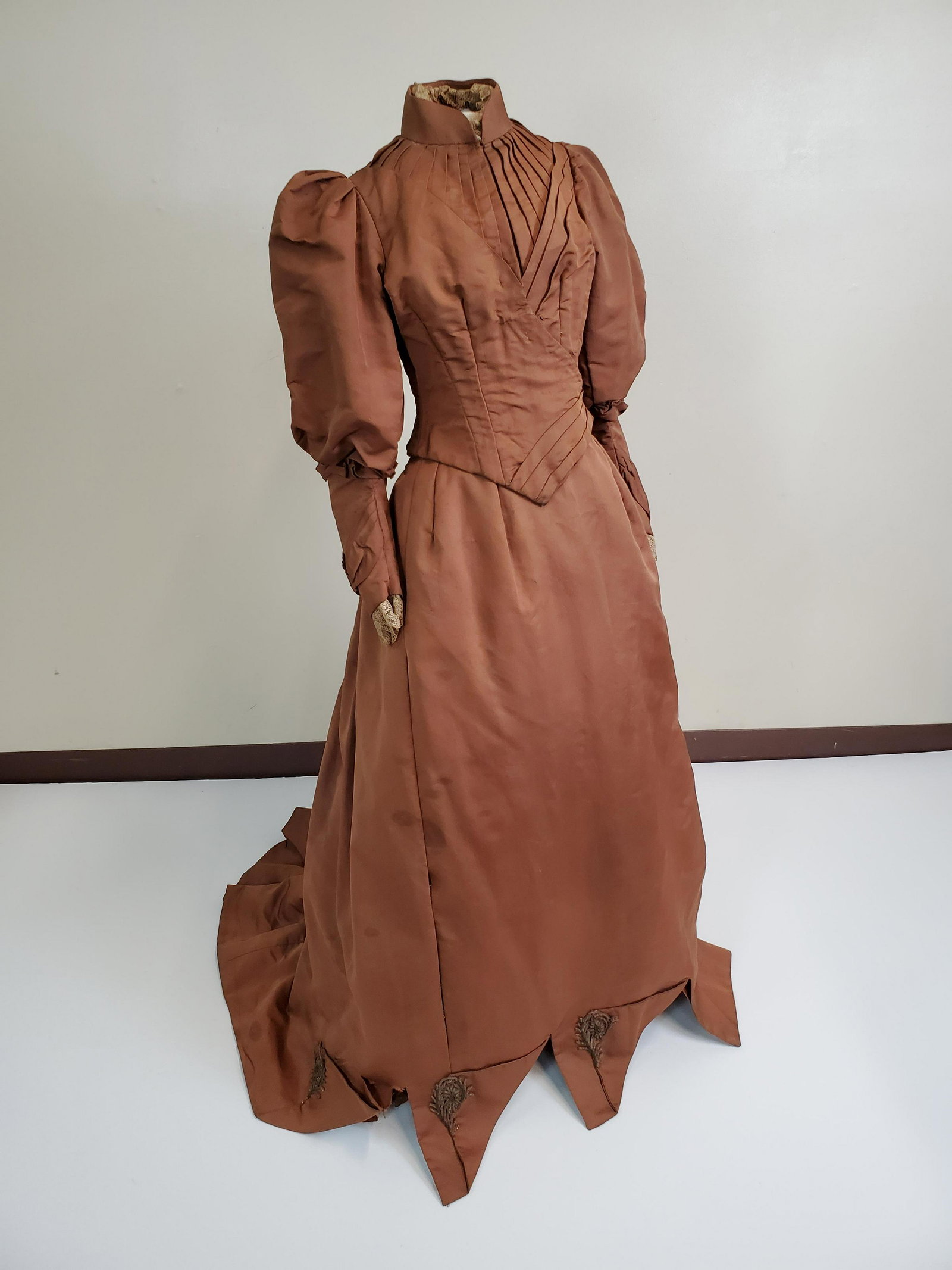 Antique Dress On Form: Has a few rips. Waist width 8 1/2", shoulder width 17", overall length 62". IMPORTANT: Before bidding, please read the terms and conditions. When you registered for the auction you agreed to these ter