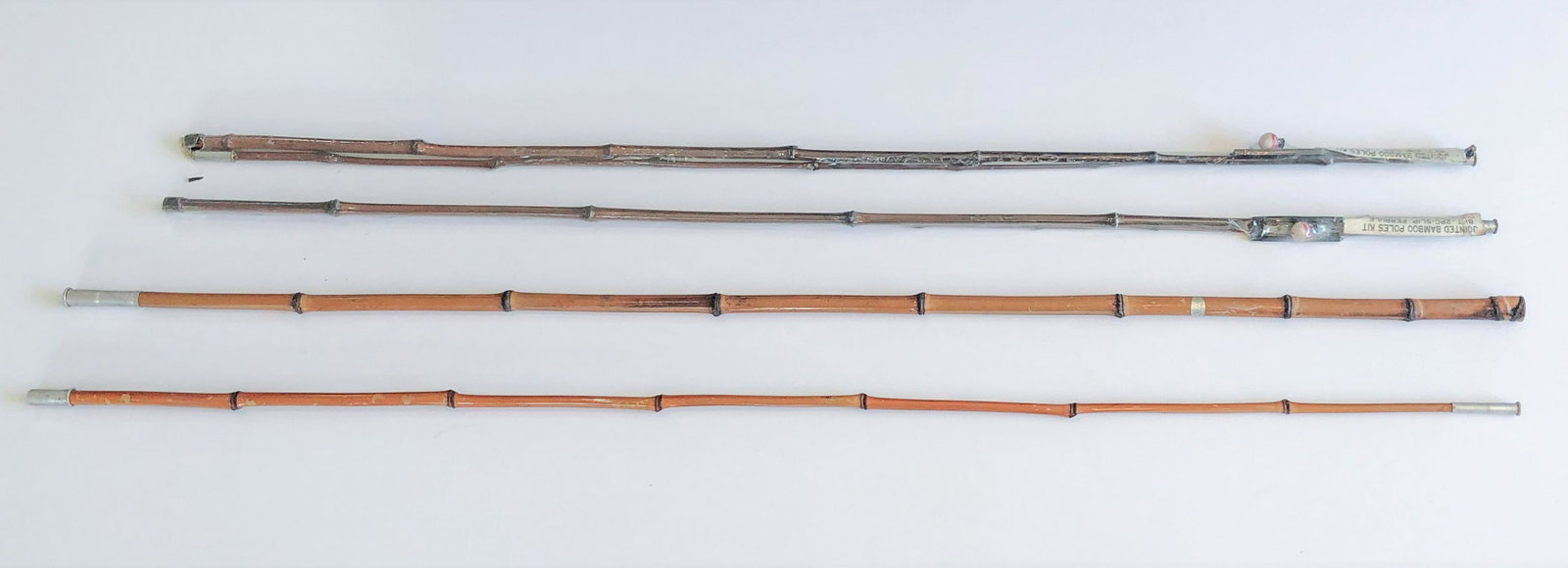 3 Bamboo Fishing Poles: 2 in original packaging as full kits. IMPORTANT: Before bidding, please read the terms and conditions. When you registered for the auction you agreed to these terms and will be required to comply with