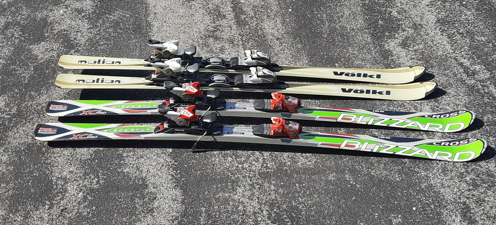 2 Pairs Shaped Down Hill Skis: Volkl Motion 1.56. Marker bindings. Blizzard Cross 166 XC Pro. Blizzard binding. 166" long x 14.5" radius. IMPORTANT: Before bidding, please read the terms and conditions. When you registered for the 