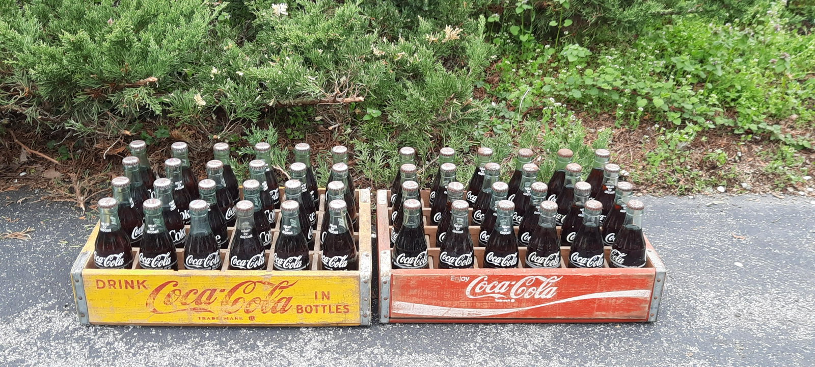 2 Vintage Coke Crates with Bottles: 48 bottles total. 18 1/2" long x 11 1/2" wide x 4" high. IMPORTANT: Before bidding, please read the terms and conditions. When you registered for the auction you agreed to these terms and will be requ