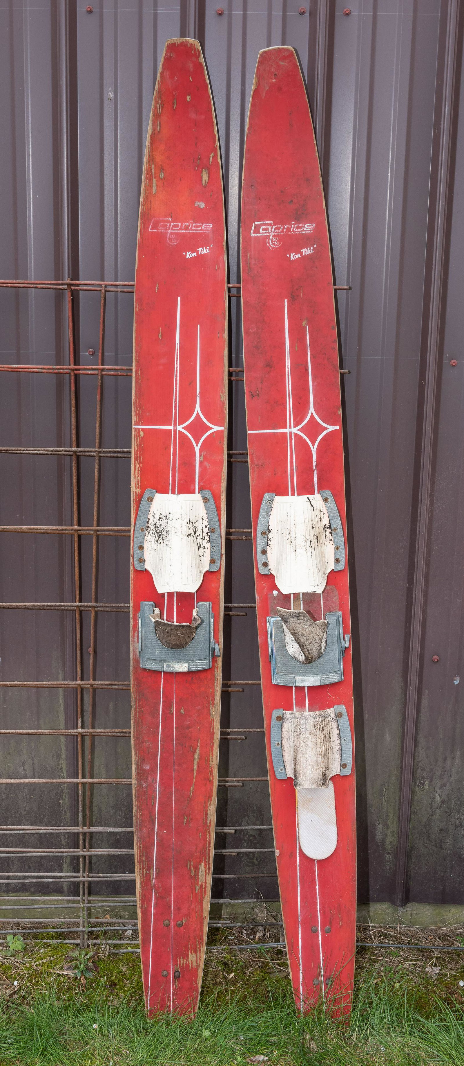 Pair of Vintage Caprice Water Skis: Kon Tiki. 69" long. IMPORTANT: Before bidding, please read the terms and conditions. When you registered for the auction you agreed to these terms and will be required to comply with them.