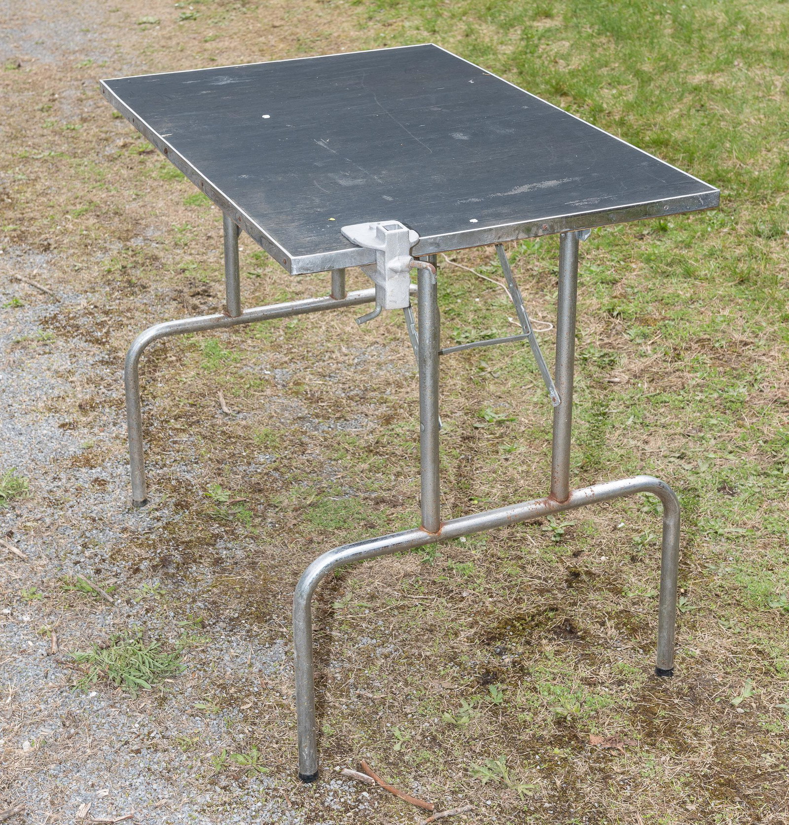 Dog Grooming Table: Does not include collaring accessories. Rubber top 36" long x 25" wide x 29" high. With affixed clamp. IMPORTANT: Before bidding, please read the terms and conditions. When you registered for the auct