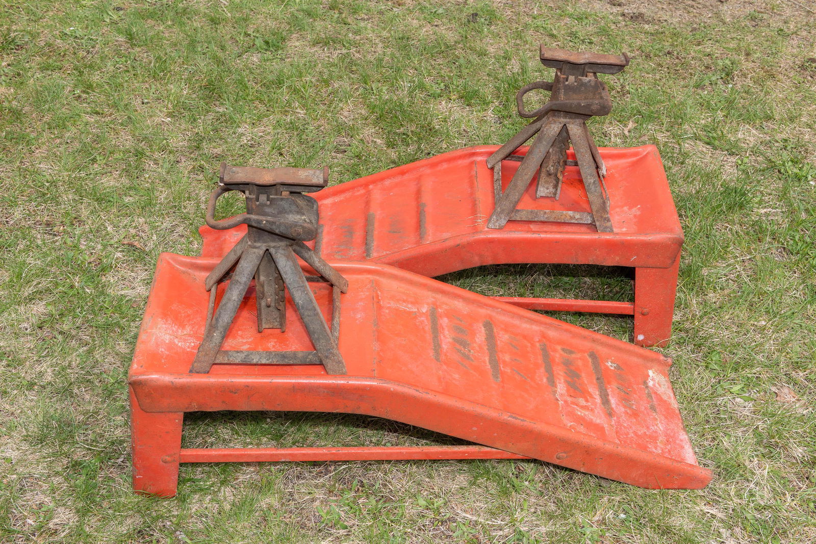 Pair of Automotive Jacks and Ramps: Ramps 35" long x 10" high. IMPORTANT: Before bidding, please read the terms and conditions. When you registered for the auction you agreed to these terms and will be required to comply with them.
