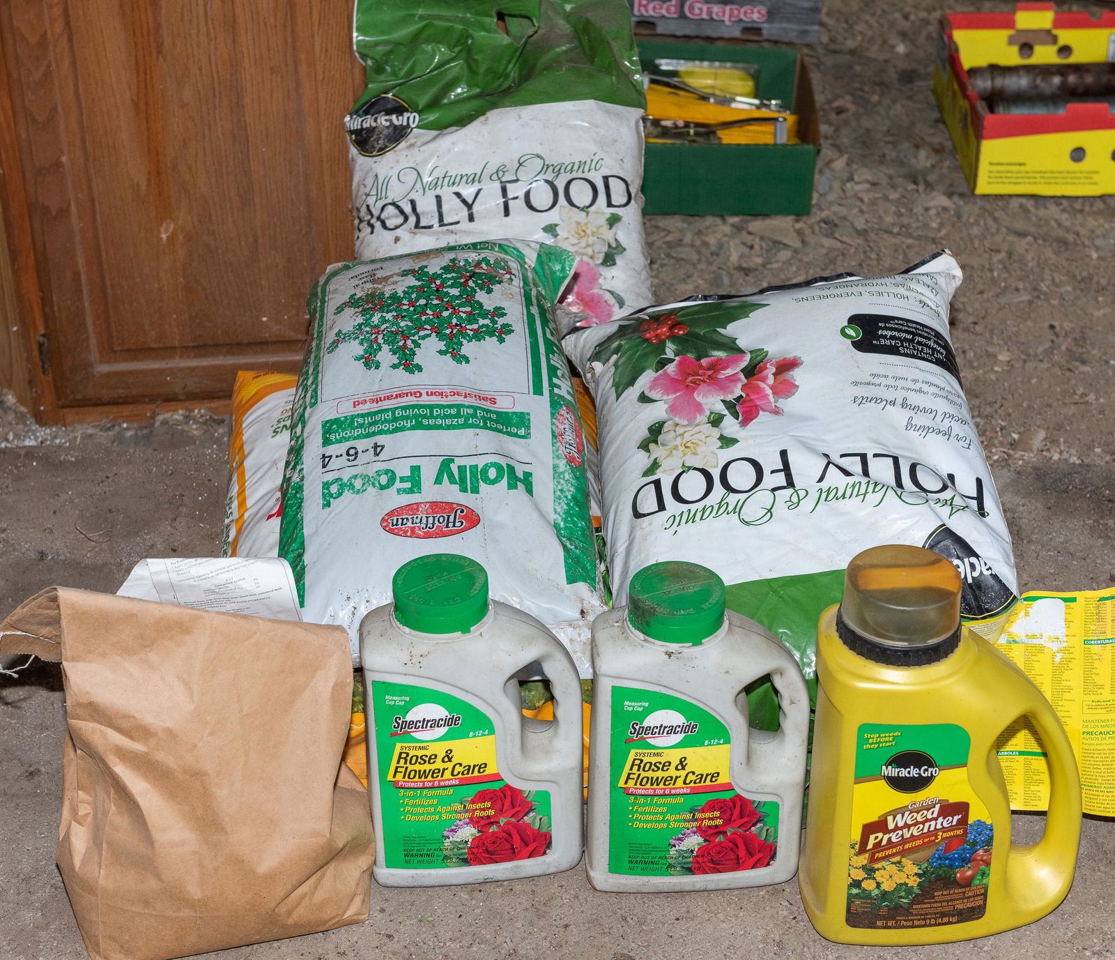 9 Bags & Jugs of Fertilizer (1 of 1)