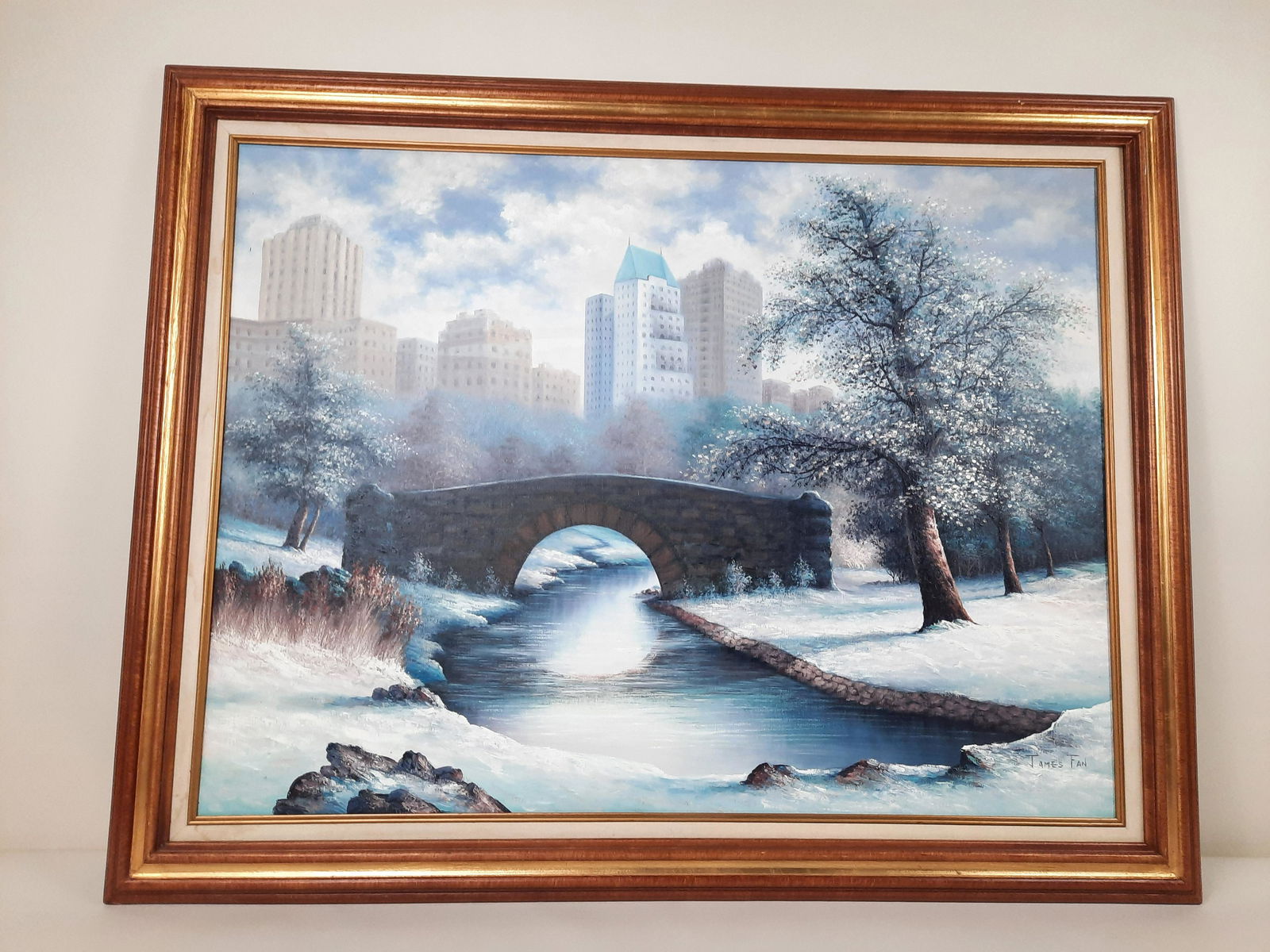 James Fan Winter Bridge Painting: Overall with frame 37-1/2" high x 47" wide. Minor frame losses.