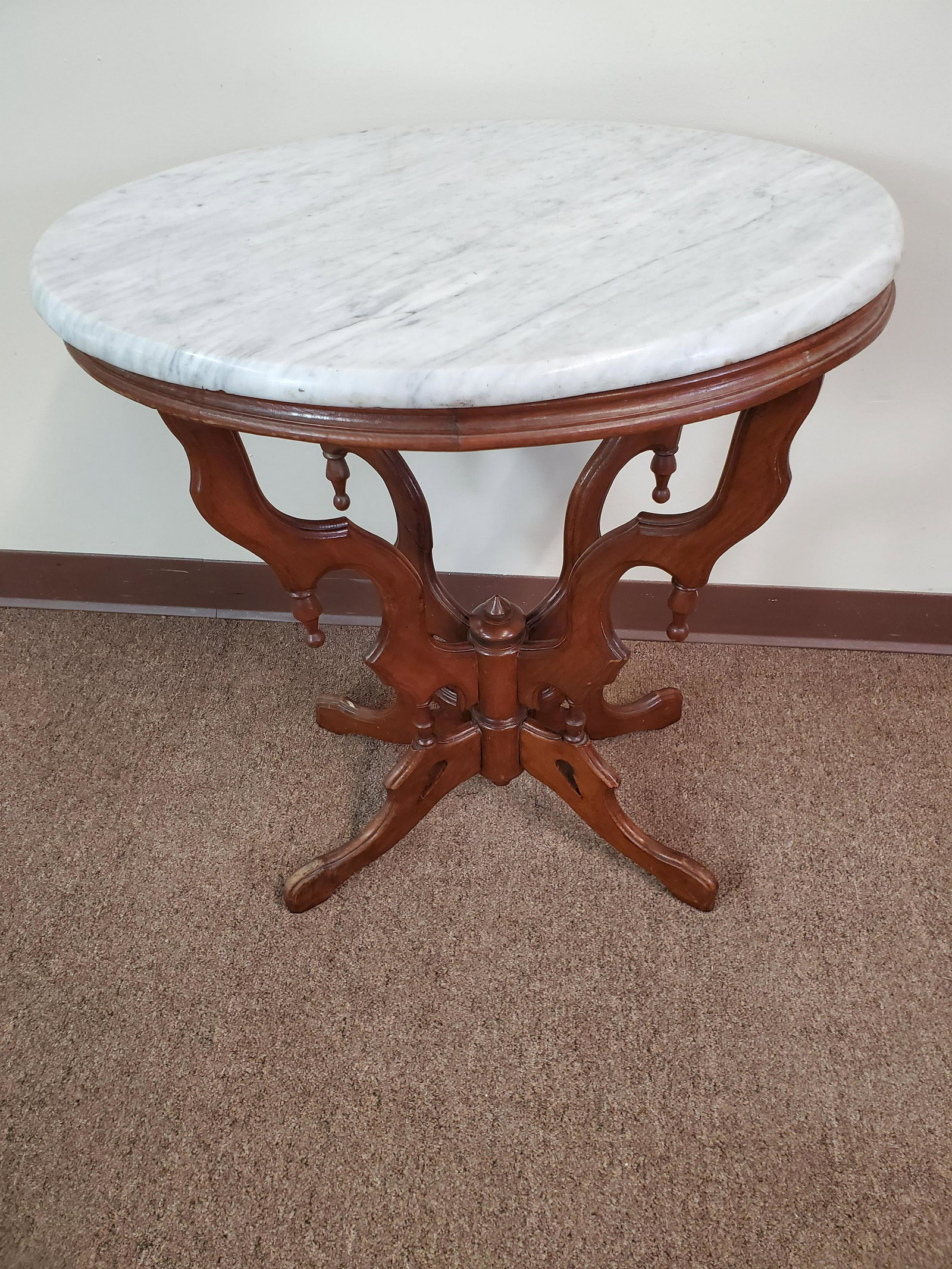 Oval Marble Top Table: 24" wide X 17 1/2" deep X 27 1/2".