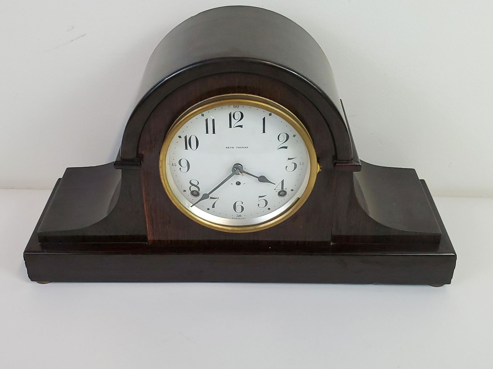 Seth Thomas Clock: 16 1/4" wide X 5 1/4" deep X 9 1/2" high. Working.