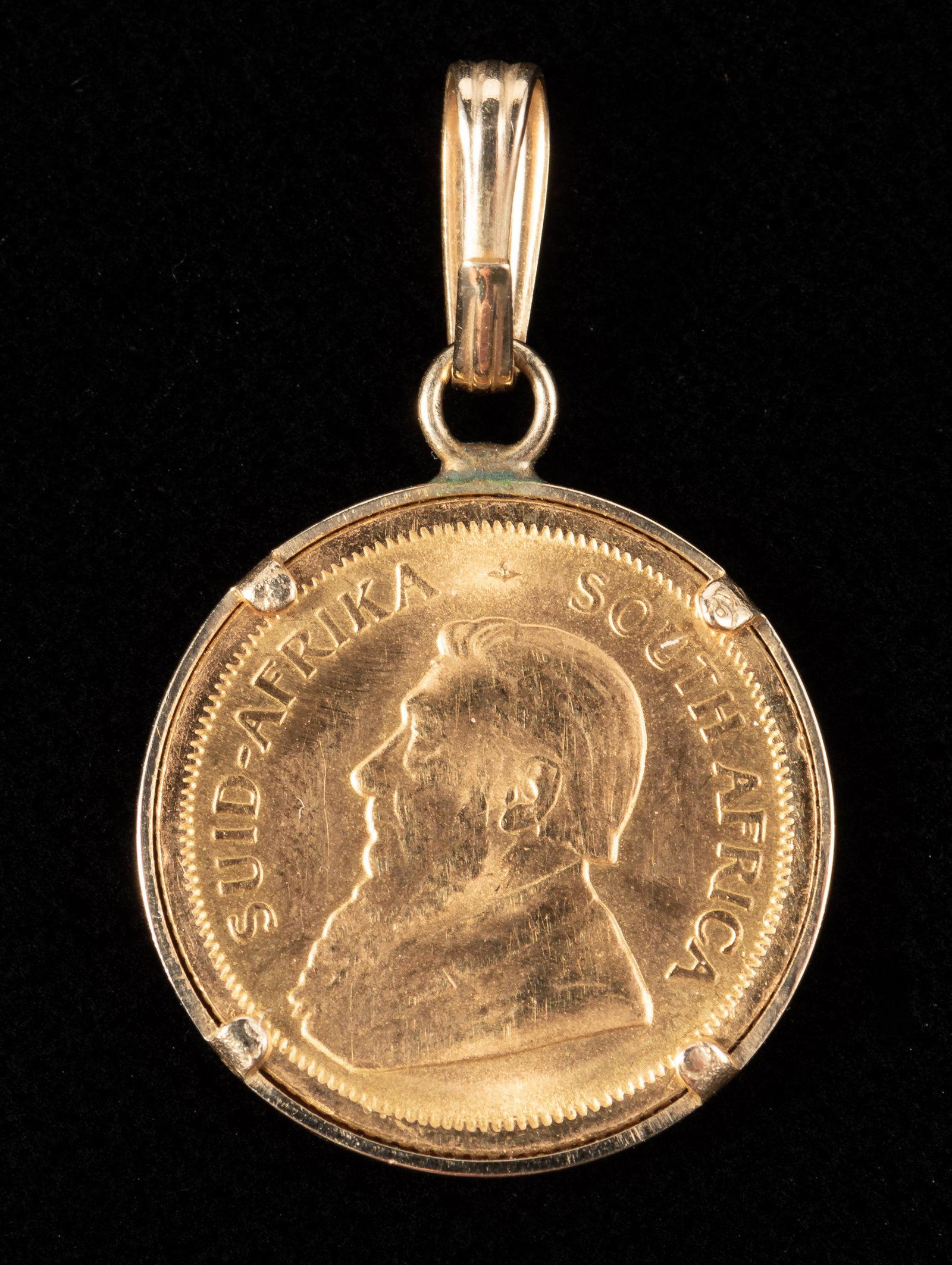1983 1/10th Ounce Krugerrand: 1983 1/10th Ounce Krogerrand on gold bail. IMPORTANT: Before bidding, please read the terms and conditions. When you registered for the auction you agreed to these terms and will be required to comply