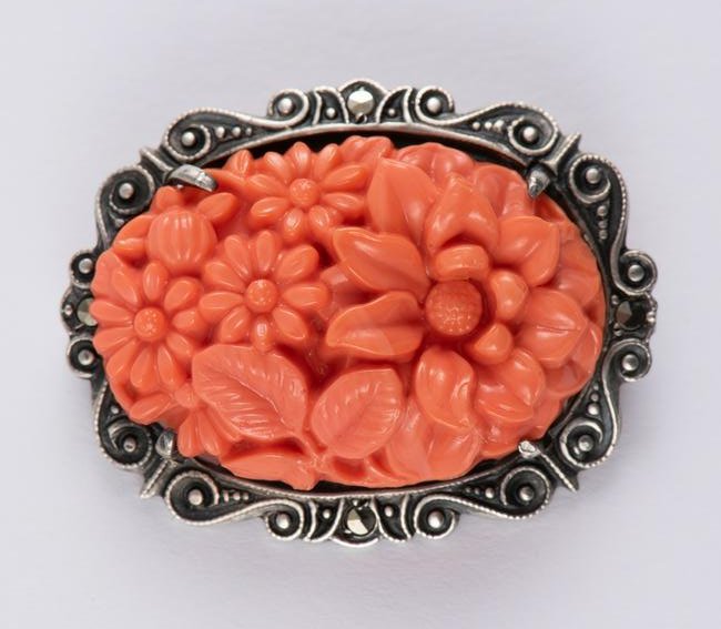 Sterling, Coral, & Marcasite Floral Brooch: 1-1/4" high. IMPORTANT: Before bidding, please read the terms and conditions. When you registered for the auction you agreed to these terms and will be required to comply with them.