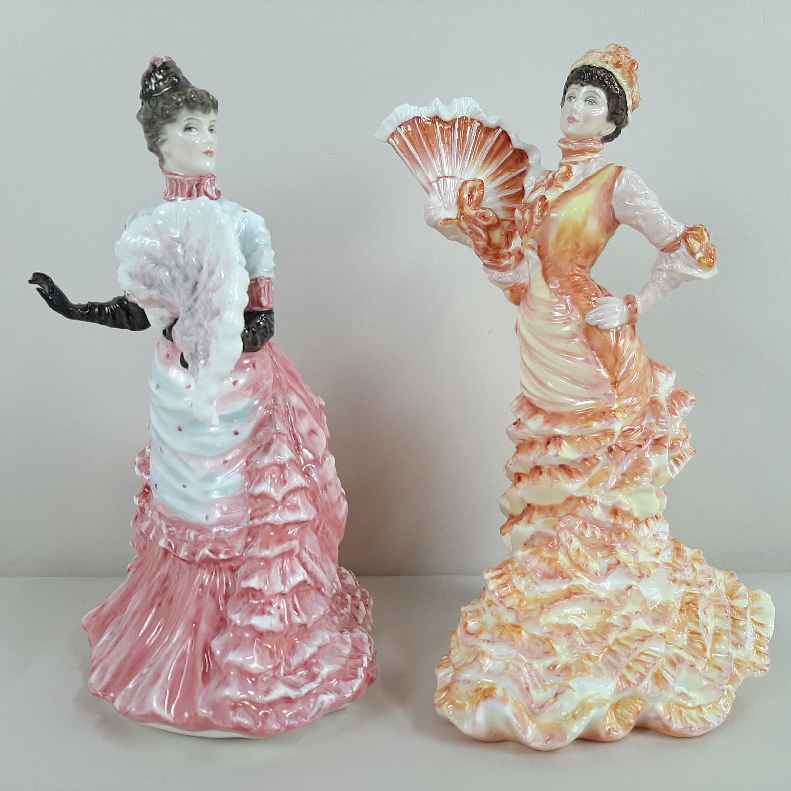 2 Royal Doulton Tissot Figurines: Includes "Le Bal" H.N. 3702 and "L'Ambitieuse" H.N. 3359. 8" to 8¾" high. IMPORTANT: Before bidding, please read the terms and conditions. When you registered for the auction you agreed to these term