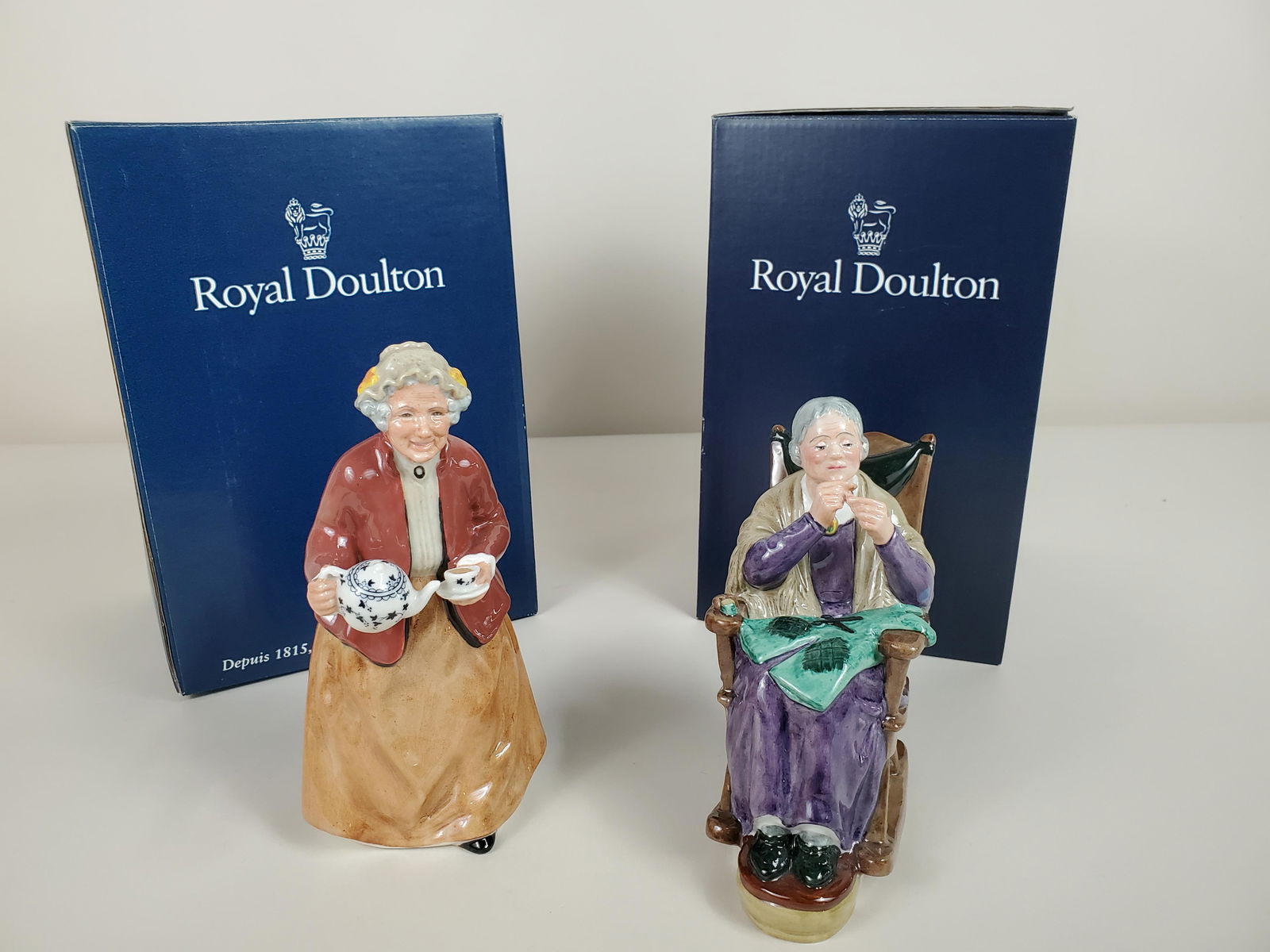 2 Royal Doulton Figurines incl A Stitch In Time (1 of 6)