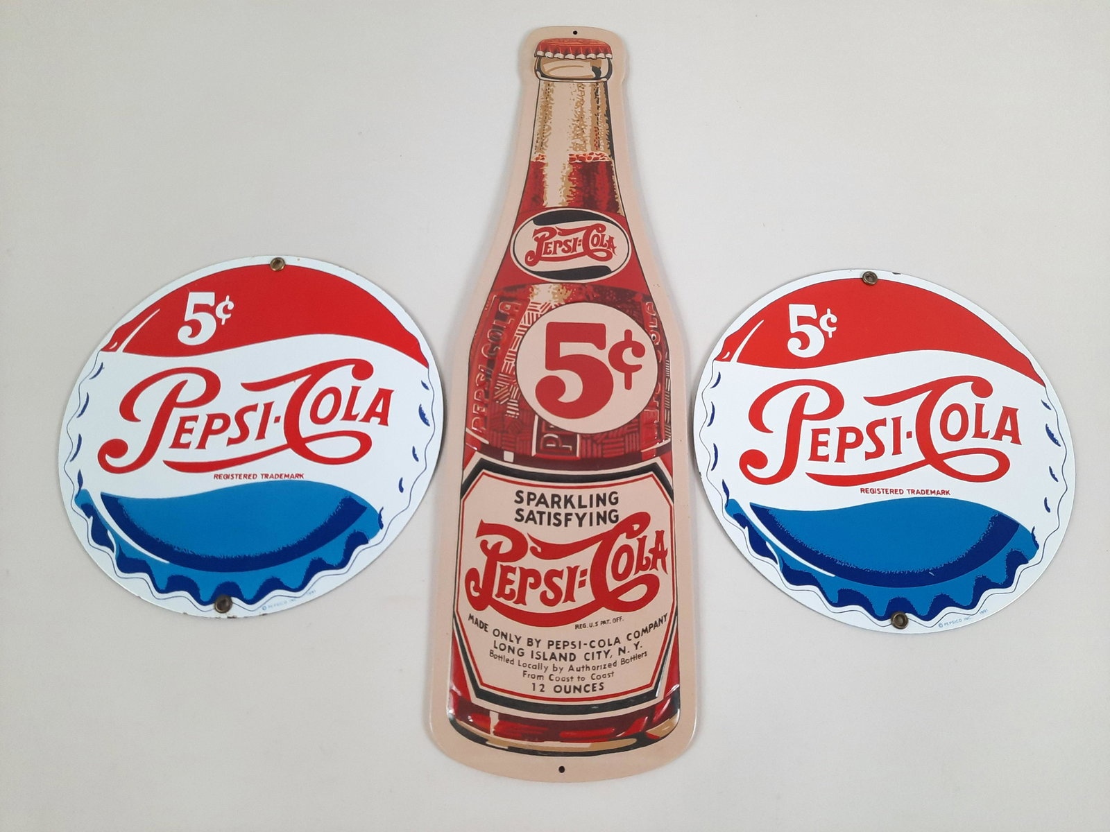 3 Pepsi-Cola Porcelain Signs: Ande Rooney Reproductions. 5" to 8" high x 8" to 17-1/2" wide. IMPORTANT: Before bidding, please read the terms and conditions. When you registered for the auction you agreed to these terms and will b
