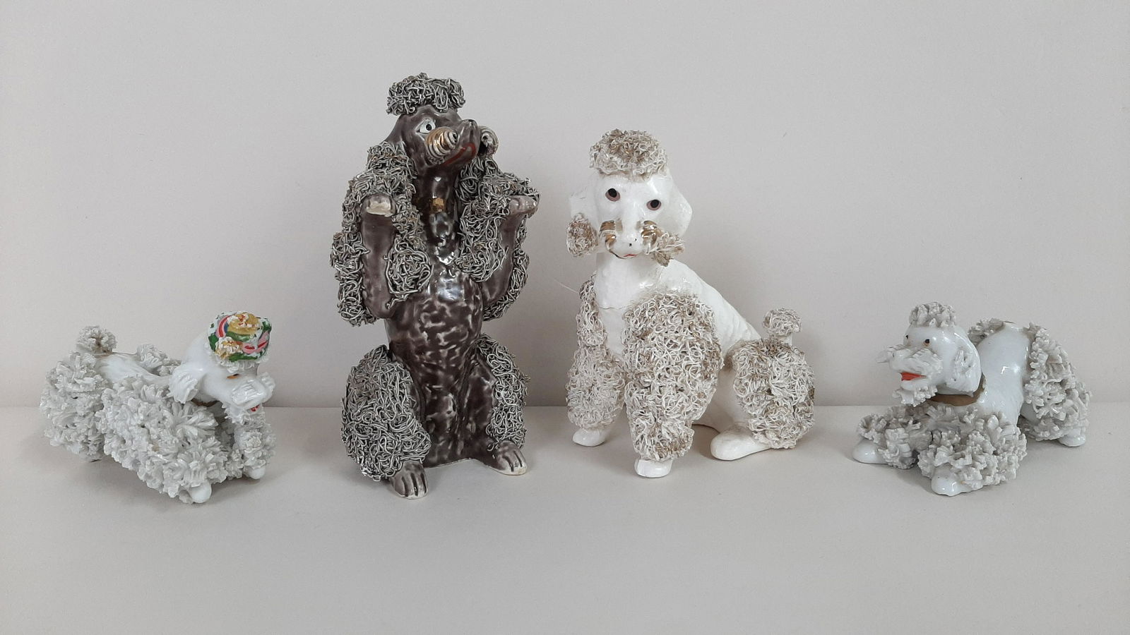 4 Porcelain Dog Figurines (1 of 7)