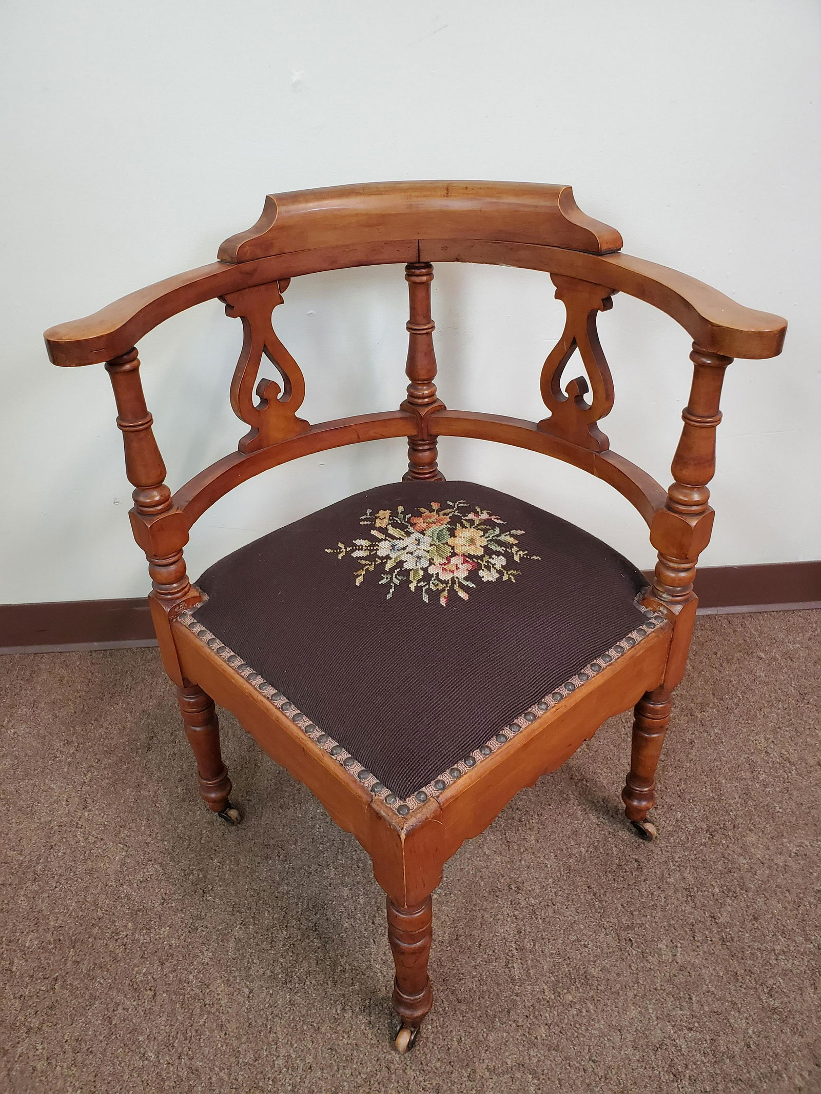 Needlepoint Corner Chair: 24" wide X 24" deep X 30 1/2" high. Back rail has split. IMPORTANT: Before bidding, please read the terms and conditions. When you registered for the auction you agreed to these terms and will be requ