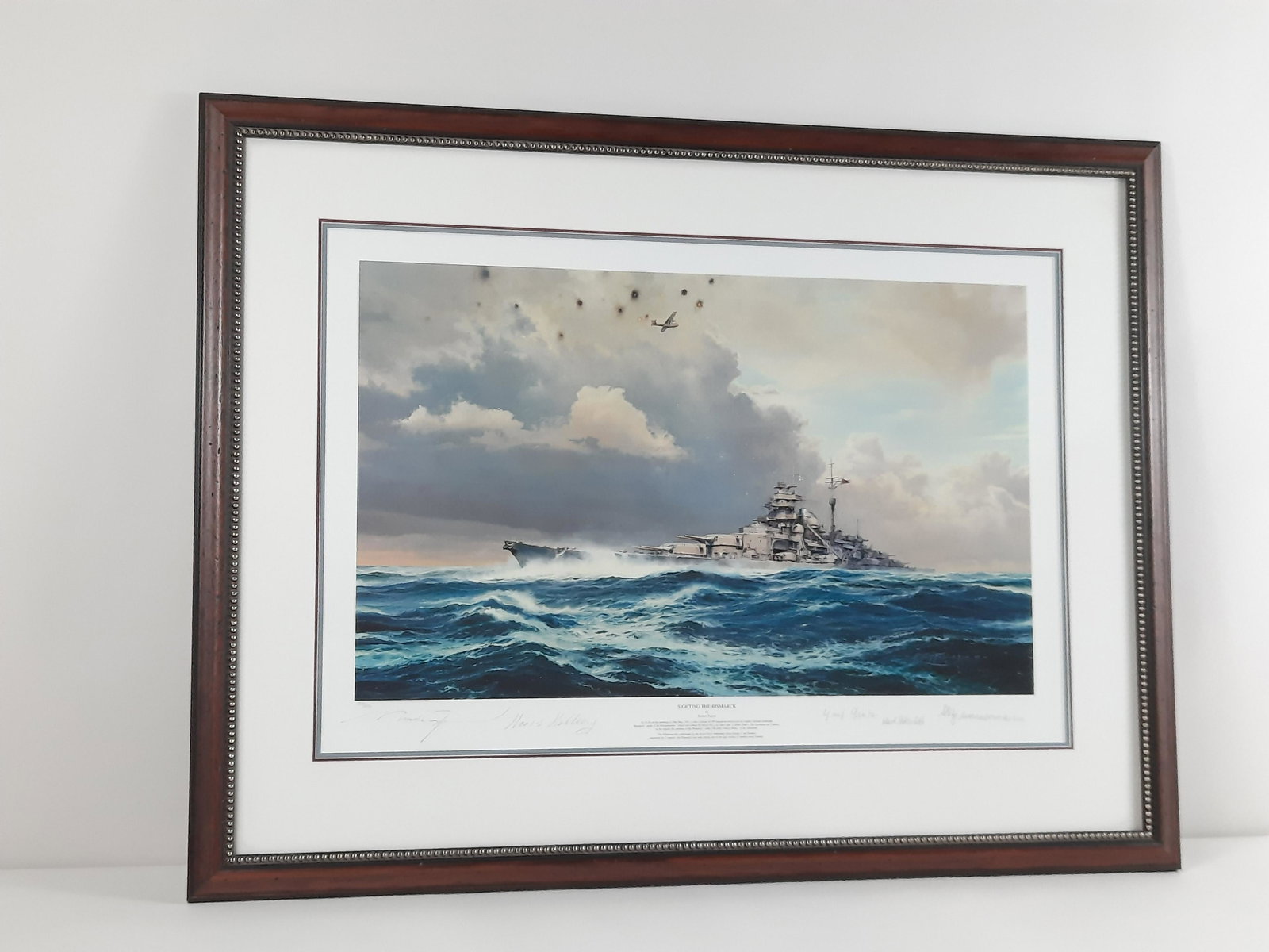 Robert Taylor "Sighting The Bismarck" Print: Autographed. Edition number 189 / 850. Overall with frame 28-1/2" high x 37-1/2" wide. IMPORTANT: Before bidding, please read the terms and conditions. When you registered for the auction you agreed t
