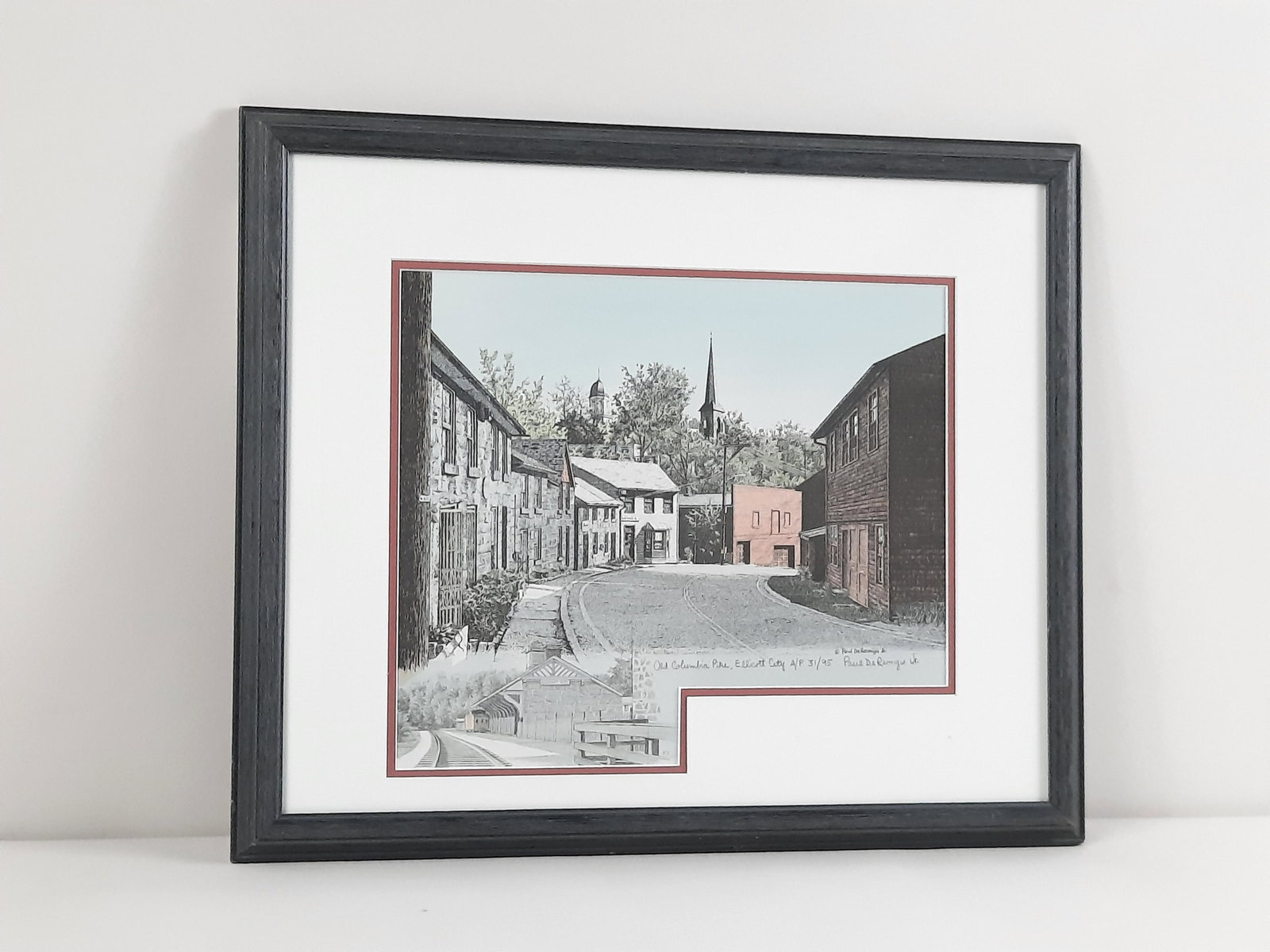Paul De Remigis Jr. Ellicott City Print: Old Columbia Pike, Ellicott City. Artist proof edition number 31 / 95. Overall with frame 15-1/4" high x 18-1/4" wide. IMPORTANT: Before bidding, please read the terms and conditions. When you registe