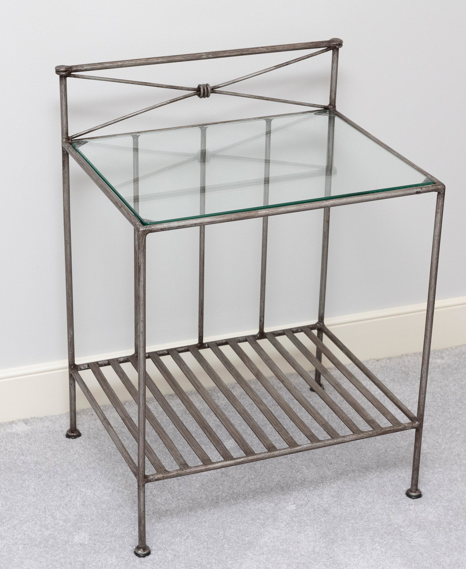 Glass Top Side Table: Painted steel frame with beveled glass top. 20" wide x 16" deep x 27-1/2" high. IMPORTANT: Before bidding, please read the terms and conditions. When you registered for the auction you agreed to these