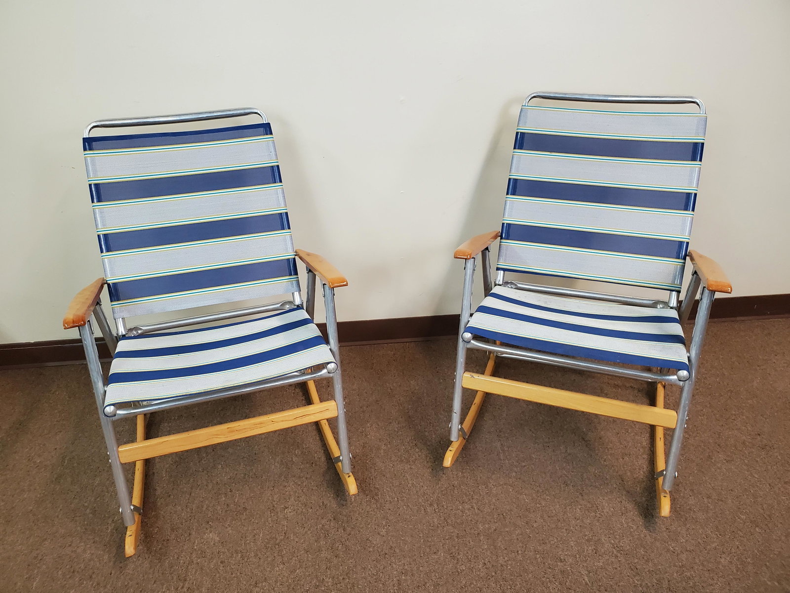 2 Telescope Folding Rockers With Wood Accents: 24 1/2" wide X 28" deep X 35" high. IMPORTANT: Before bidding, please read the terms and conditions. When you registered for the auction you agreed to these terms and will be required to comply with t