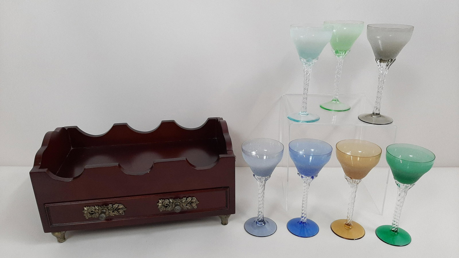 12 Pcs Wine Glasses and Holder with Stoppers: Also includes stoppers and opener. Glasses: 7" high. Holder: 14-1/4" wide X 9-1/4" deep X 7-1/2" high. IMPORTANT: Before bidding, please read the terms and conditions. When you registered for the auct