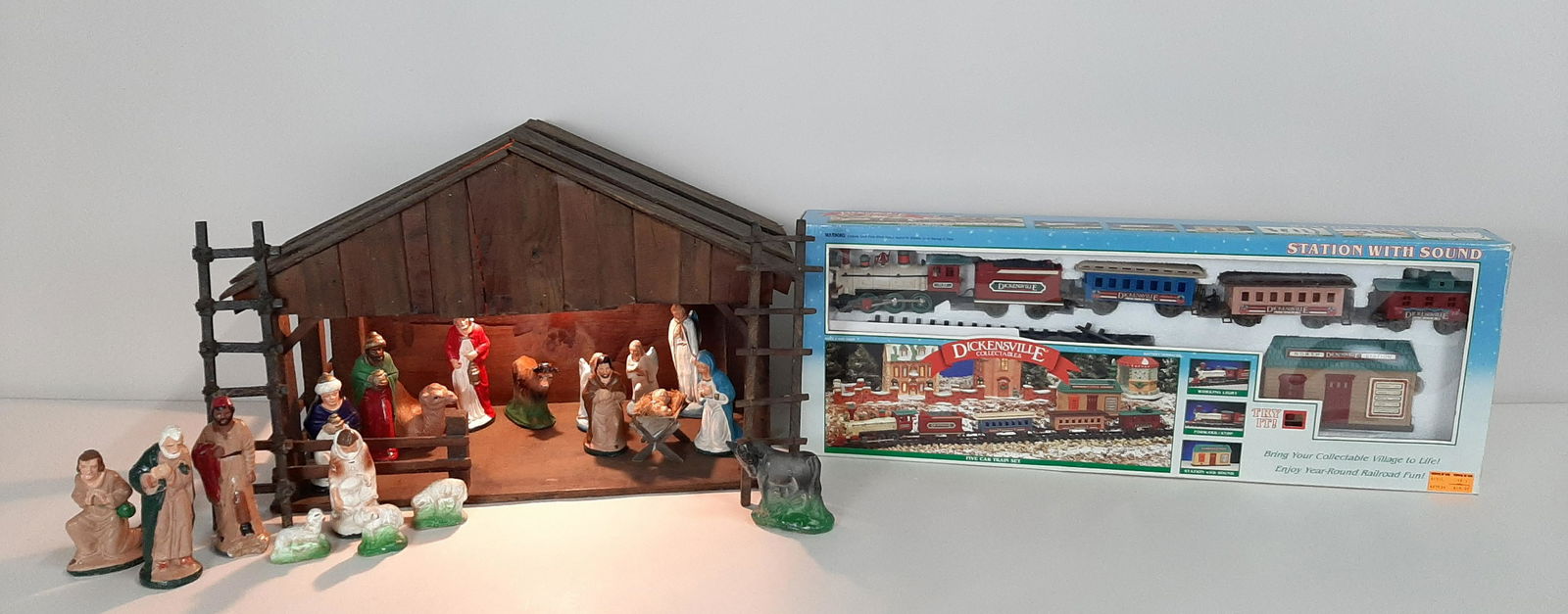 Vintage Nativity and Dickensville Train Set: Nativity: 21-1/2" wide X 11-1/4" X 14" high. Figurines 1-3/4" to 6" high. Dickensville Set no. 171L. IMPORTANT: Before bidding, please read the terms and conditions. When you registered for the auctio