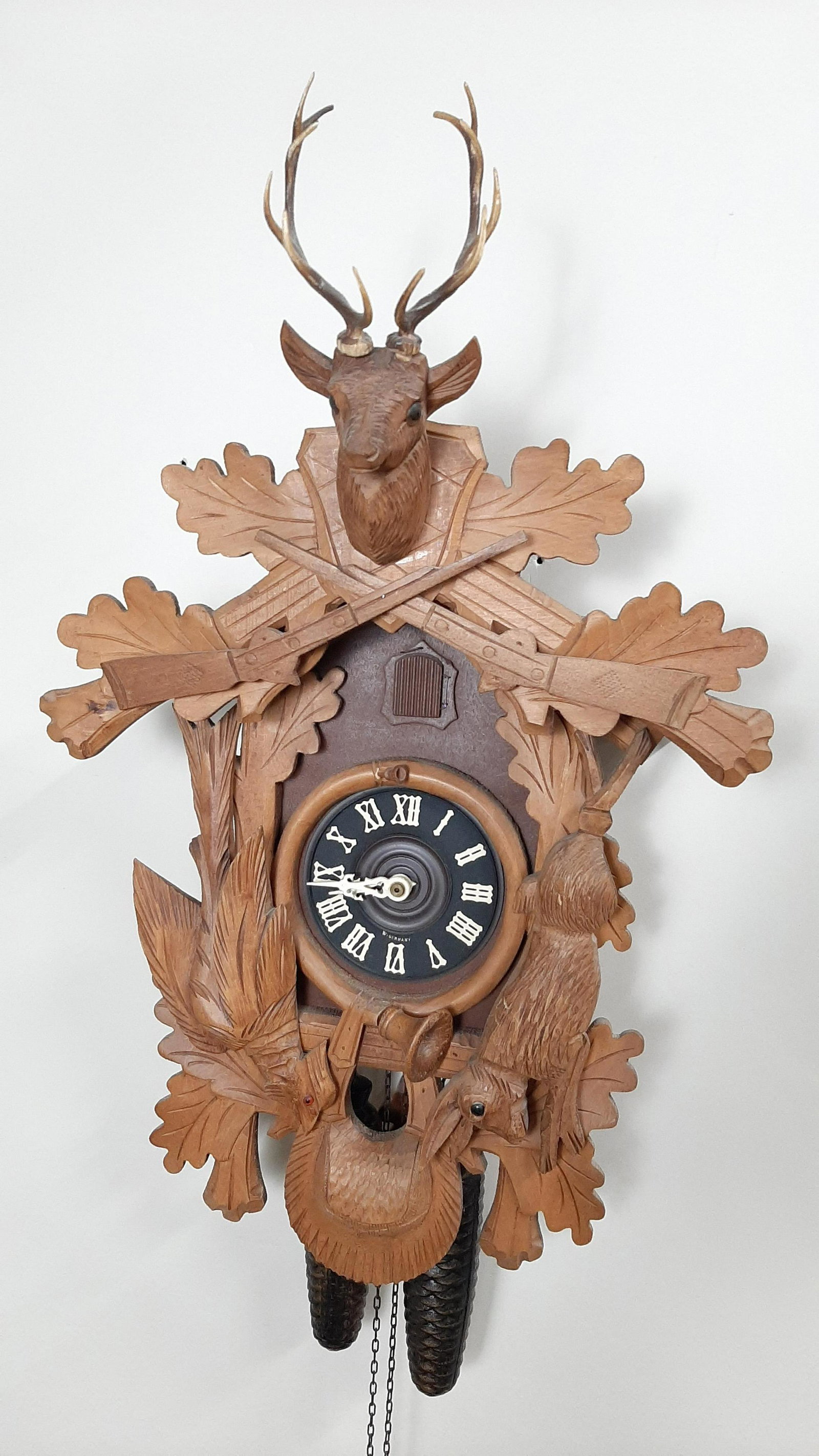 Cuckoo Clock: 14-1/4" wide X 10-1/2" deep X 23-1/2" high. Starts and stops. Probably overwound. IMPORTANT: Before bidding, please read the terms and conditions. When you registered for the auction you agreed to the