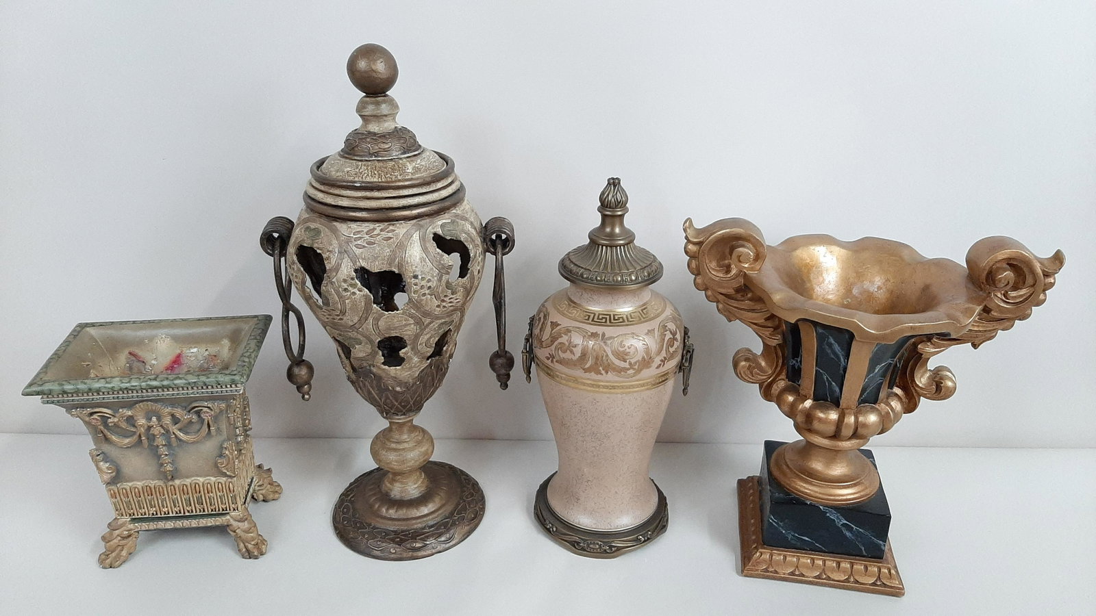 4 Decorative Urns and Planters: 7-1/2" to 14-1/2" wide X 10" to 22" high. IMPORTANT: Before bidding, please read the terms and conditions. When you registered for the auction you agreed to these terms and will be required to comply 