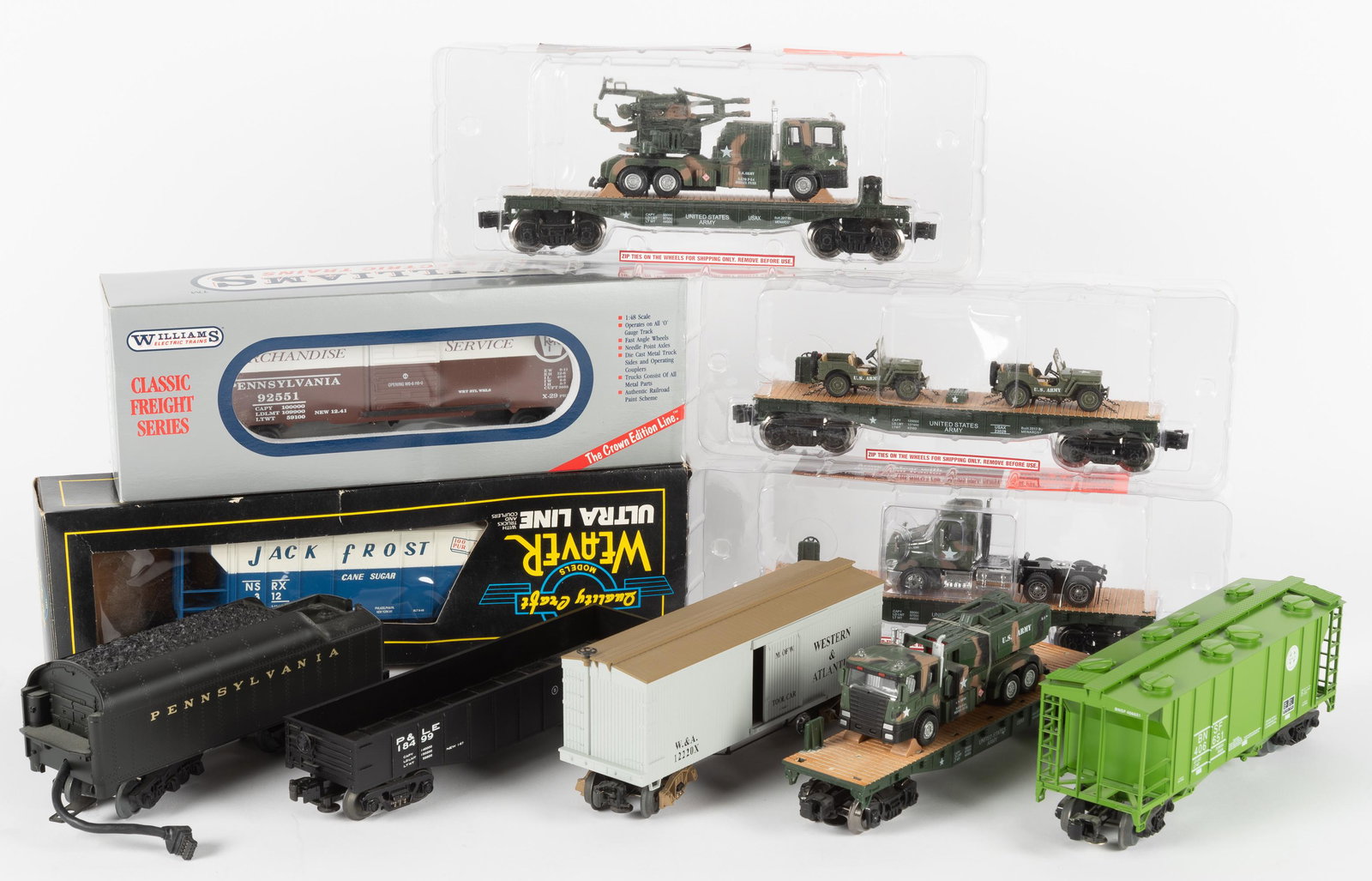10 Pcs Rolling Stock Incl. Williams: Includes Williams PRR classic freight car No. 29, Weaver Jack Frost #312 PS-2 covered hopper car, MTH PRR coal tender, P & LE New York Central car, MTH Western & Atlantic tool car, Burlington Northern
