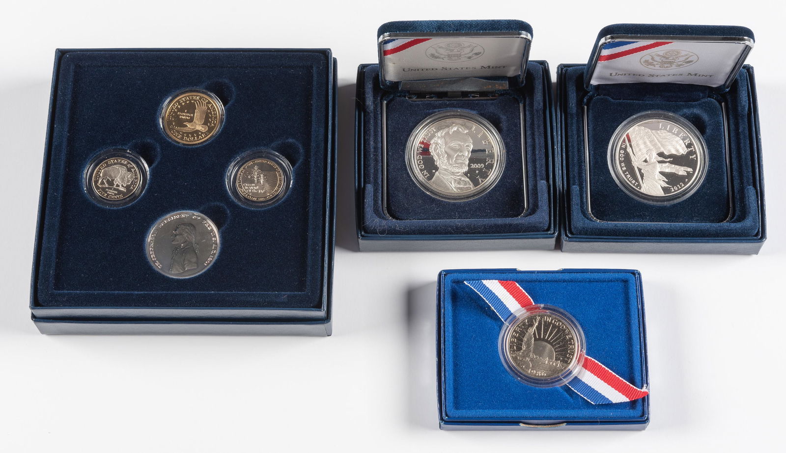 4 U.S. Items Incl 1986 Statue of Liberty Quarter (1 of 7)