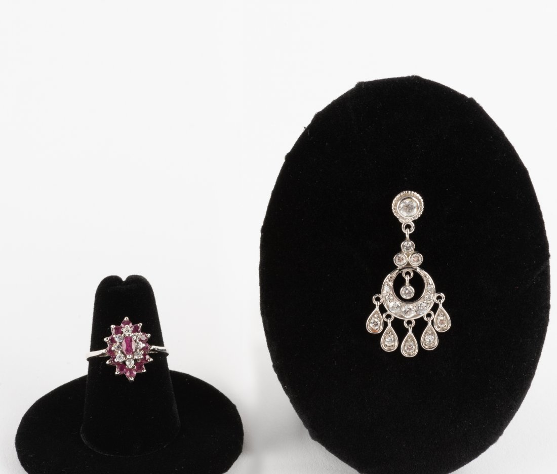 Sterling Ring & Pendant: Sterling ring with rubies and white topaz, size 6. Sterling CZ pendant, 1-1/2". IMPORTANT: Before bidding, please read the terms and conditions. When you registered for the auction you agreed to these