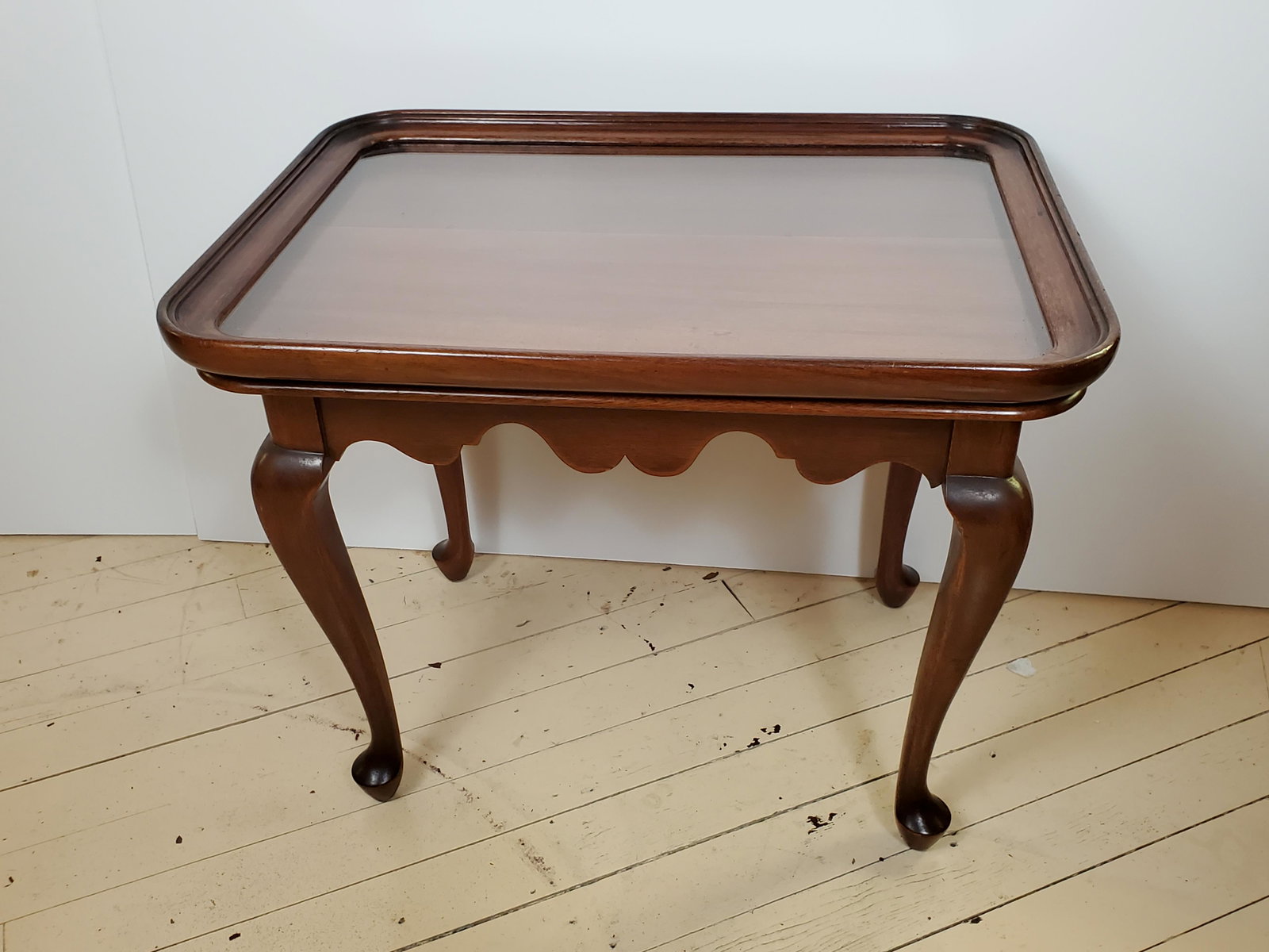Small Glass Top Tray Table: 24" wide X 18" deep X 19" high. IMPORTANT: Before bidding, please read the terms and conditions. When you registered for the auction you agreed to these terms and will be required to comply with them.