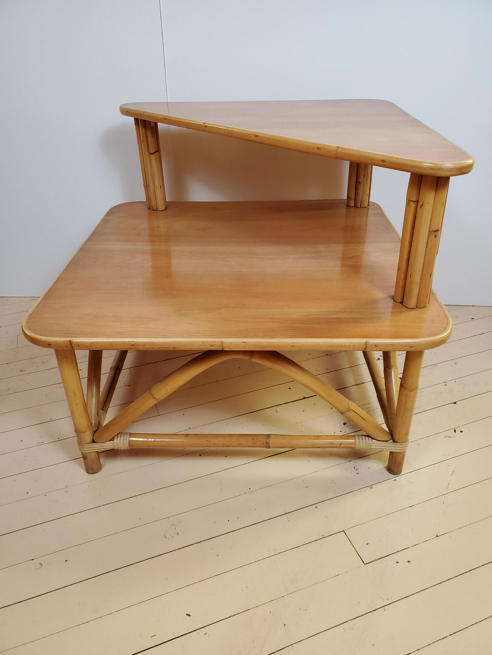 Heywood Wakefield 1950's Corner Table: Attributed to Heywood Wakefield. Unmarked. Bamboo and maple. 30 3/4" wide X 30 3/4" deep X 26" high. IMPORTANT: Before bidding, please read the terms and conditions. When you registered for the auctio