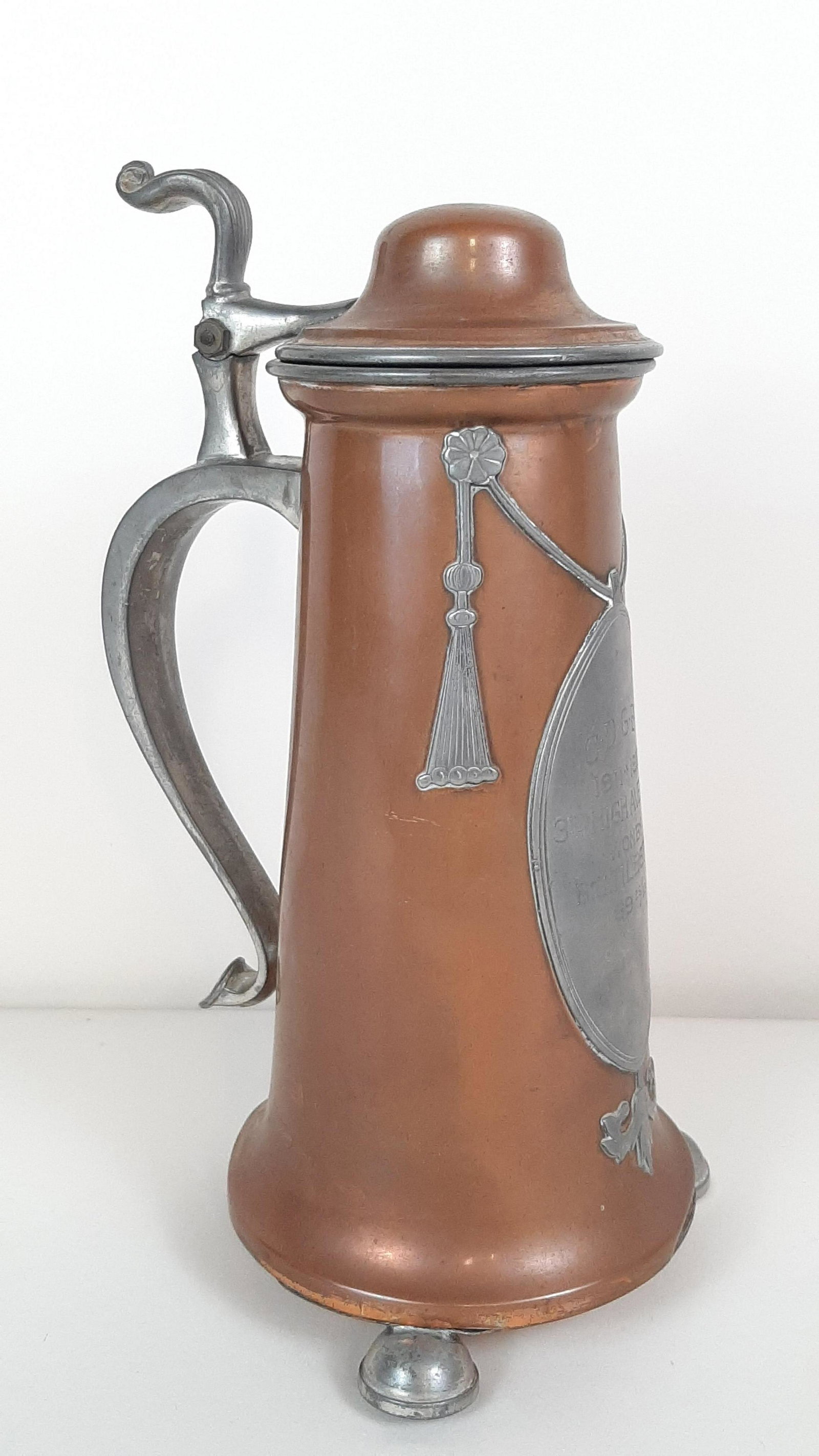Pairpoint Flagon Trophy: Front engraved "CDGBL 1911-1912 3rd high average won by B.C. Tileston." Base loose. 5-1/4" diameter X 10-1/2" high. IMPORTANT: Before bidding, please read the terms and conditions. When you registered