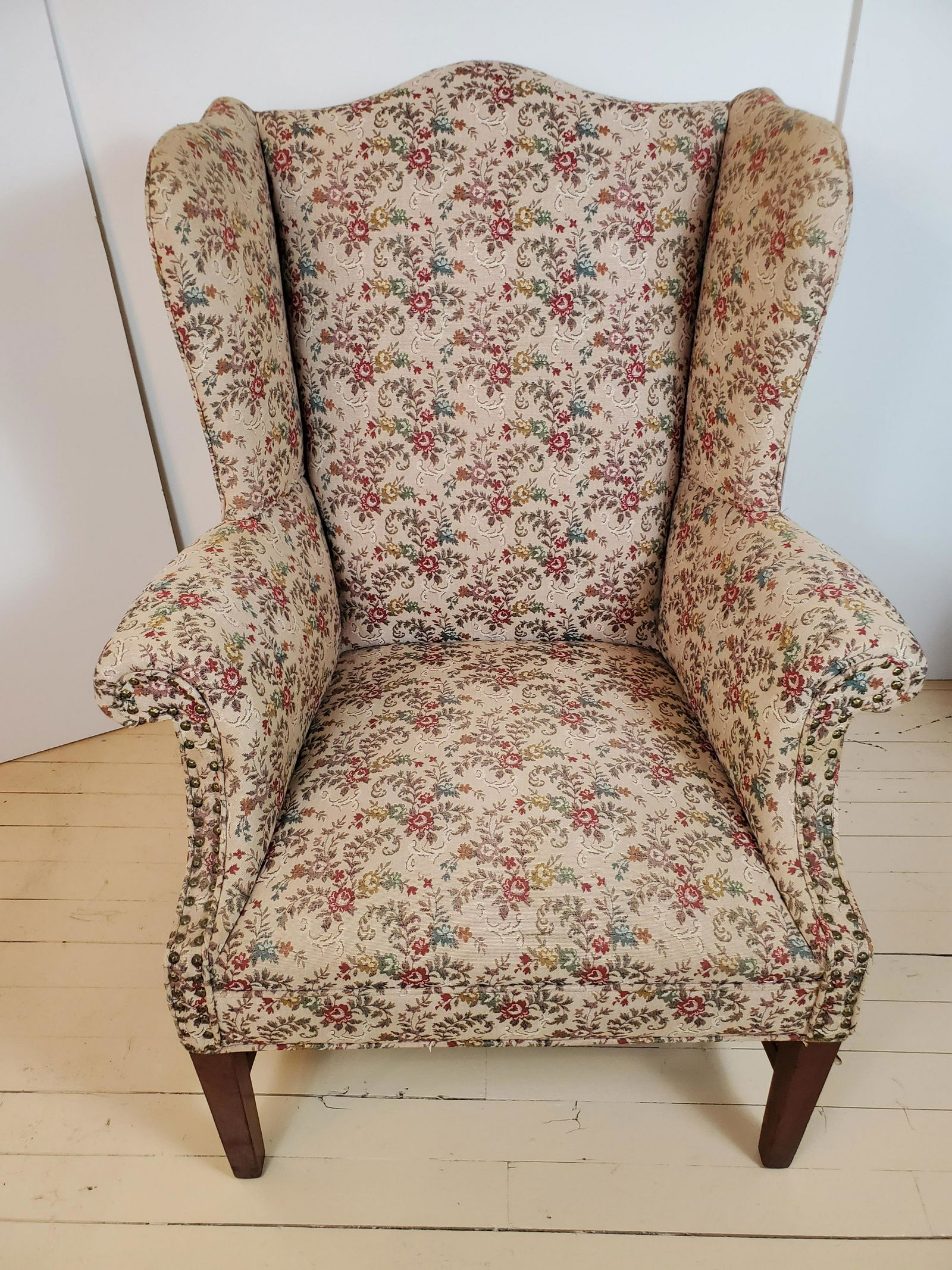 Flower Print Wingback Chair: 33 1/2" wide X 27 1/2" deep X 42 1/4" high. IMPORTANT: Before bidding, please read the terms and conditions. When you registered for the auction you agreed to these terms and will be required to compl