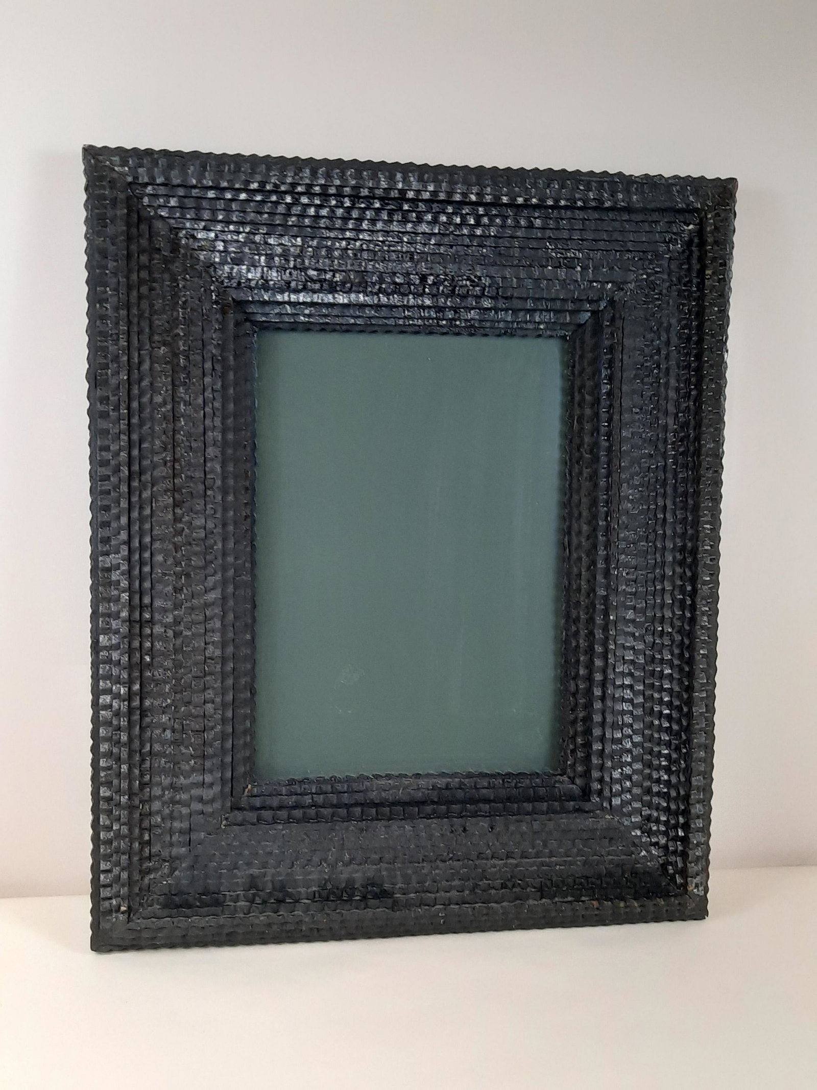 Tramp Art Frame: Opening: 13-3/4" high x 9-3/4" wide. Overall with frame 23-3/4" high x 19-1/2" wide. IMPORTANT: Before bidding, please read the terms and conditions. When you registered for the auction you agreed to 