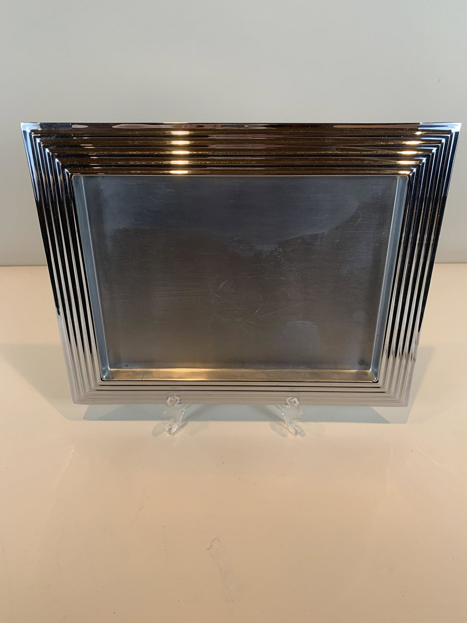 Norman Bel Geddes “Manhattan" Cocktail Tray: Norman Bell Geddes, American, 1893-1958. 11-1/2" x 14-1/2". Unused/new. In original Revere box labeled Manhattan Tray #174. IMPORTANT: Before bidding, please read the terms and conditions. When you re