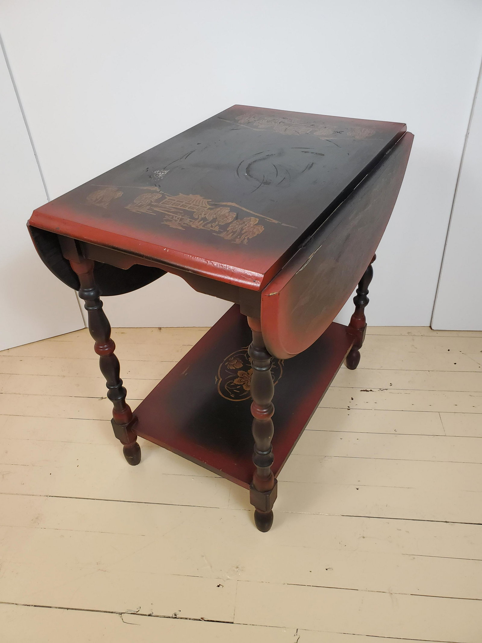 Asian Painted Drop Side Table: 17 1/2" wide X 26" deep X 26 1/2" high. IMPORTANT: Before bidding, please read the terms and conditions. When you registered for the auction you agreed to these terms and will be required to comply wi