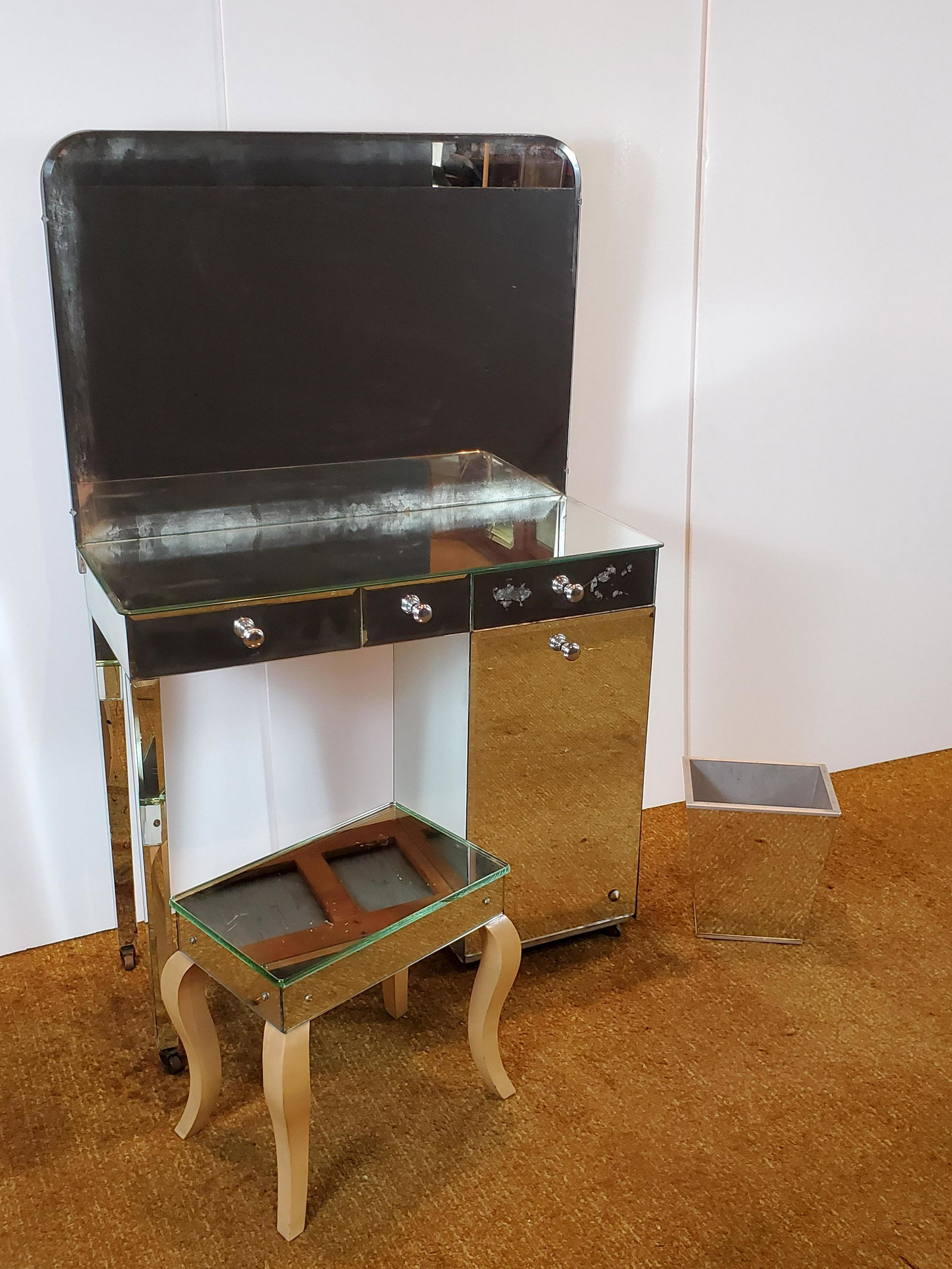 Mirrored Vanity With Stool & Waste Basket: Vanity 37" wide X 15 1/2" deep X 57 1/2" high. Waste basket 11" wide X 8 1/4" deep X 12" high. IMPORTANT: Before bidding, please read the terms and conditions. When you registered for the auction you 
