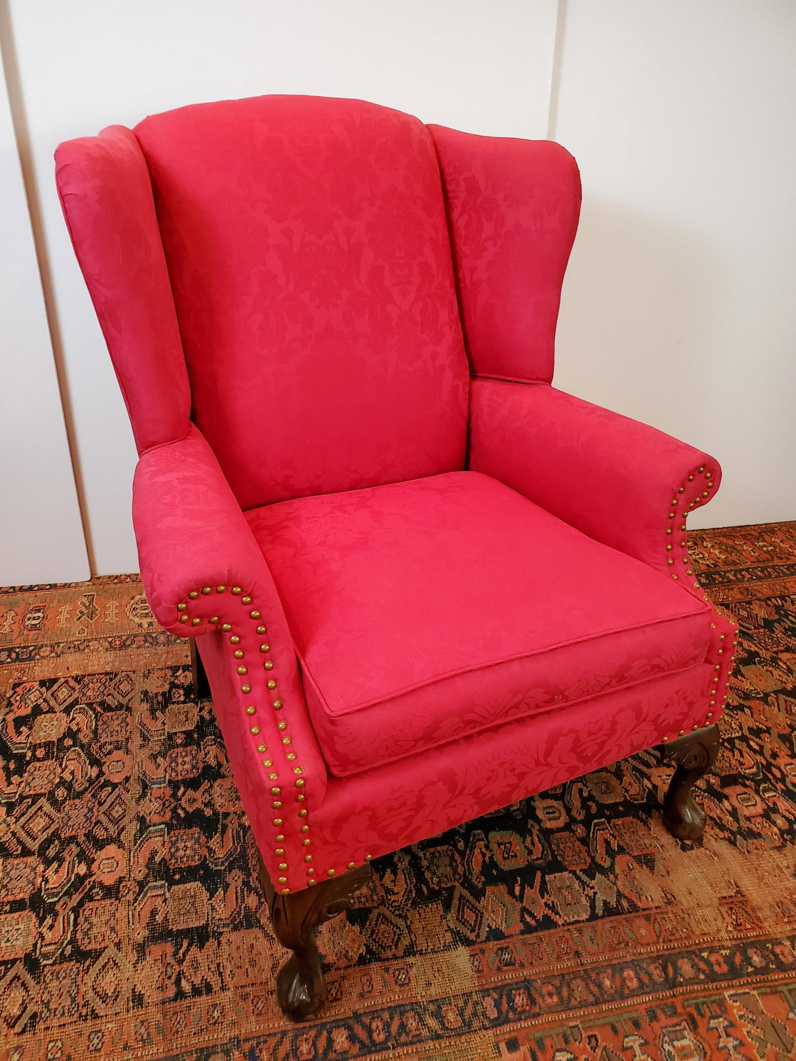 Red Wingback Chair: 33" wide X 32" deep X 39 1/2" high. IMPORTANT: Before bidding, please read the terms and conditions. When you registered for the auction you agreed to these terms and will be required to comply with t