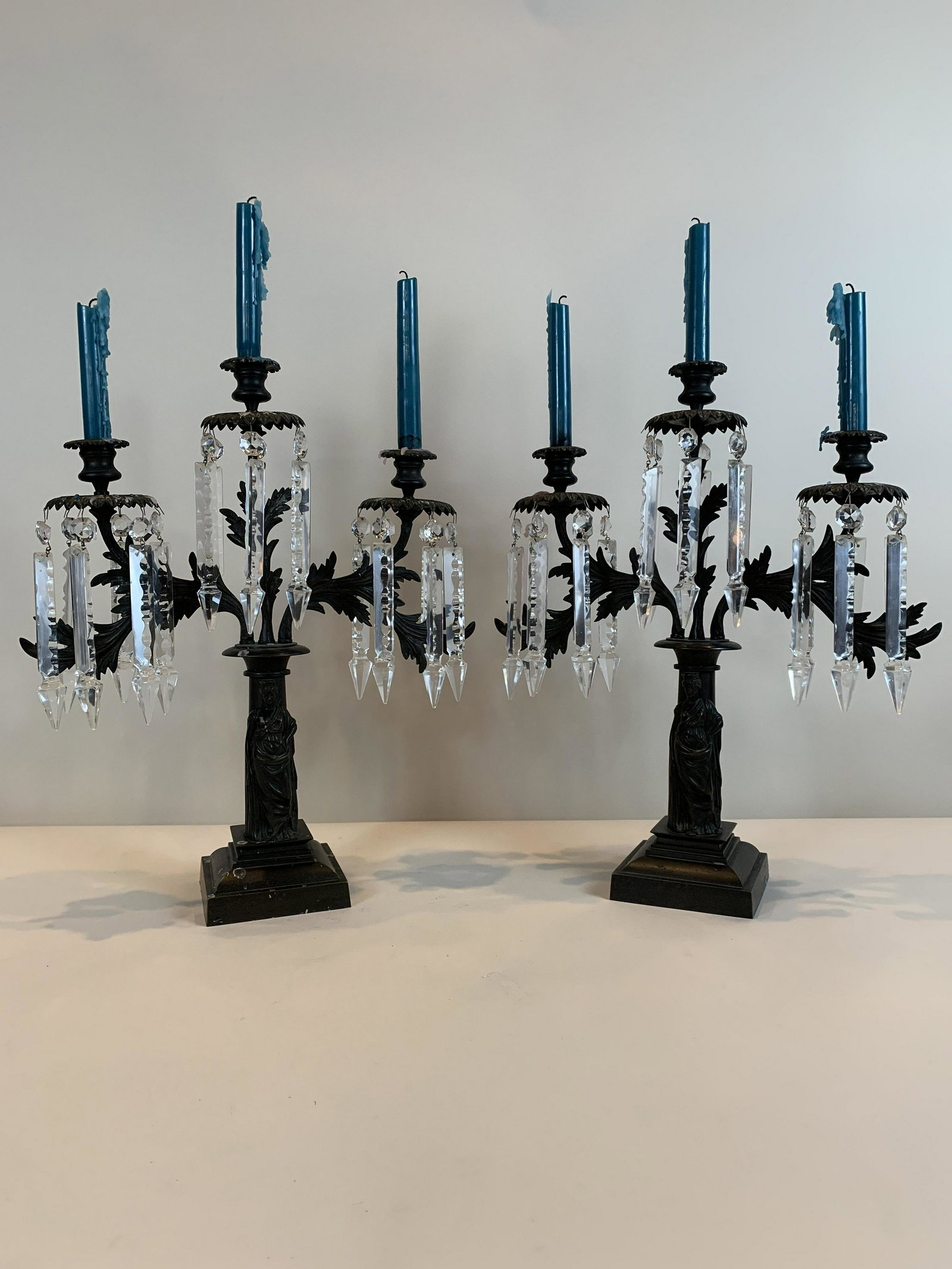 3-Light Figural Candelabra: Heavy cast brass with dark patina finish. 19" high. 5" wide at base. IMPORTANT: Before bidding, please read the terms and conditions. When you registered for the auction you agreed to these terms and 