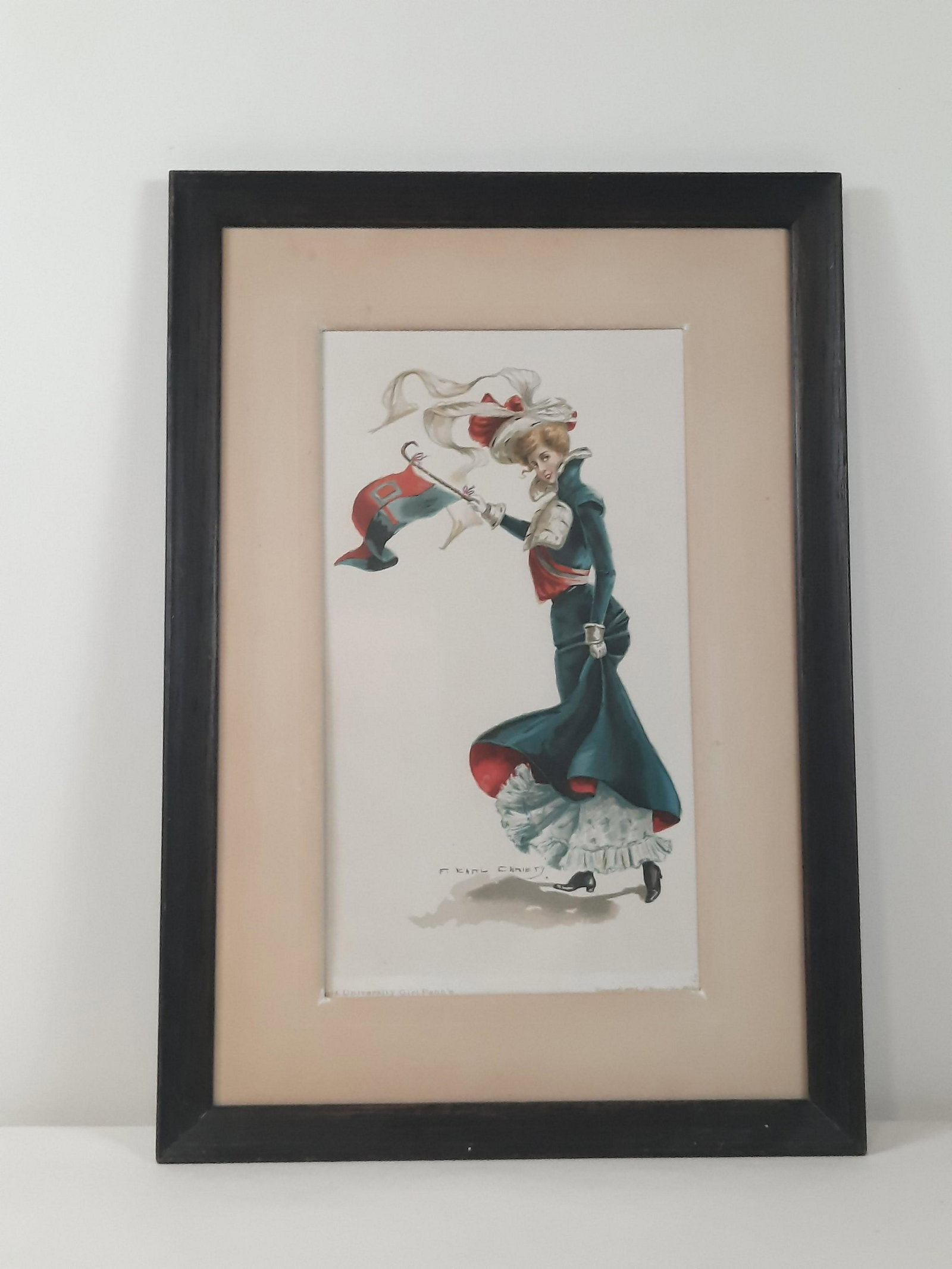 F. Earl Christy "University Girl Penn'a" Print: Copyright 1900 by J. Hoover and Sons. Overall with frame 19-3/4" high x 13-3/4" wide. IMPORTANT: Before bidding, please read the terms and conditions. When you registered for the auction you agreed to