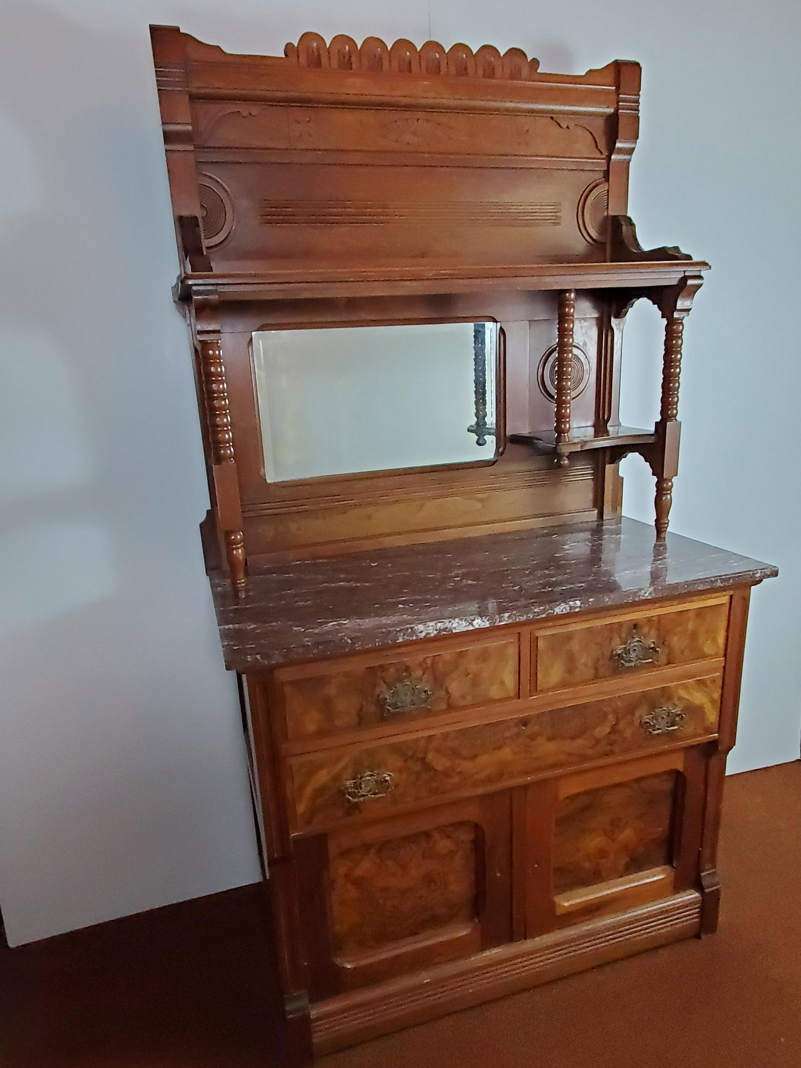 19th Century Eastlake Marble Top Sideboard: Burlwood door and drawer fronts. 43 1/2" wide X 20 1/2" deep X 78" high. IMPORTANT: Before bidding, please read the terms and conditions. When you registered for the auction you agreed to these terms 