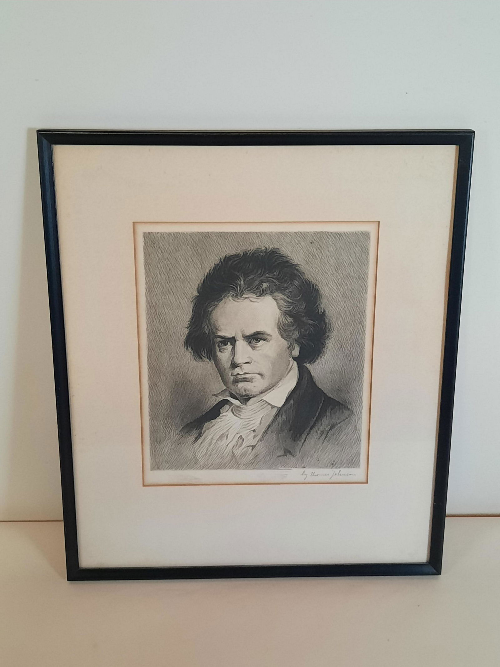 Thomas Johnson Portrait of Mozart: Overall with frameEtching. 18-1/2" high. IMPORTANT: Before bidding, please read the terms and conditions. When you registered for the auction you agreed to these terms and will be required to comply w