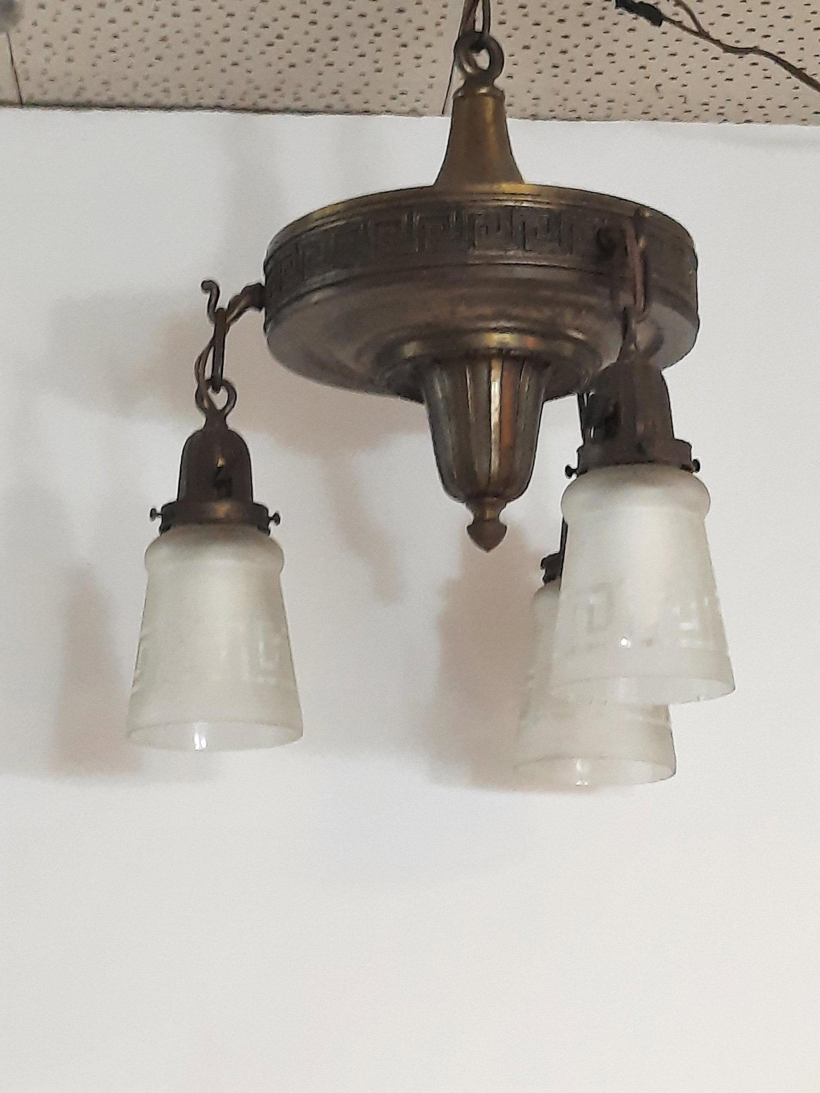 Bryant 3 Light Greek Key Hanging Light: 14-1/2" diameter x 21" high. One shade with chips. IMPORTANT: Before bidding, please read the terms and conditions. When you registered for the auction you agreed to these terms and will be required t