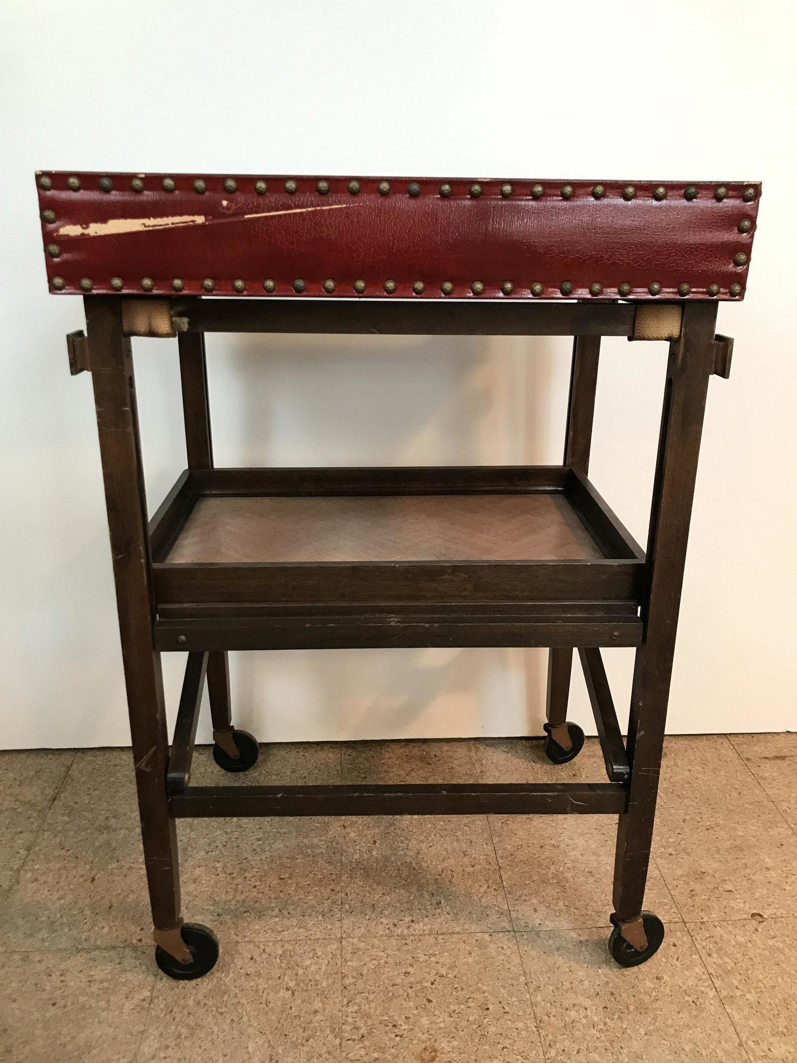 Rolling Serving Cart: 36" high. Top removable. IMPORTANT: Before bidding, please read the terms and conditions. When you registered for the auction you agreed to these terms and will be required to comply with them.