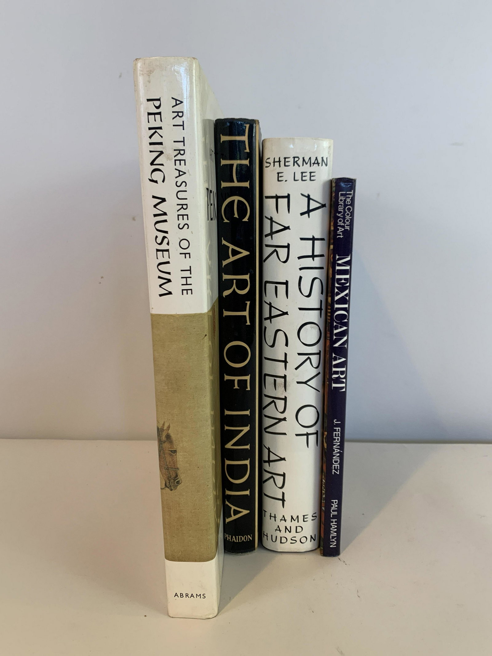 4 Books on Art: Includes Mexican Art by Justino Fernandez and The Colour Library of Art, A History of Far Eastern Art by Sherman E. Lee. The Art of India Through the Ages by Stella Kramrisch, and Art Treasures of the