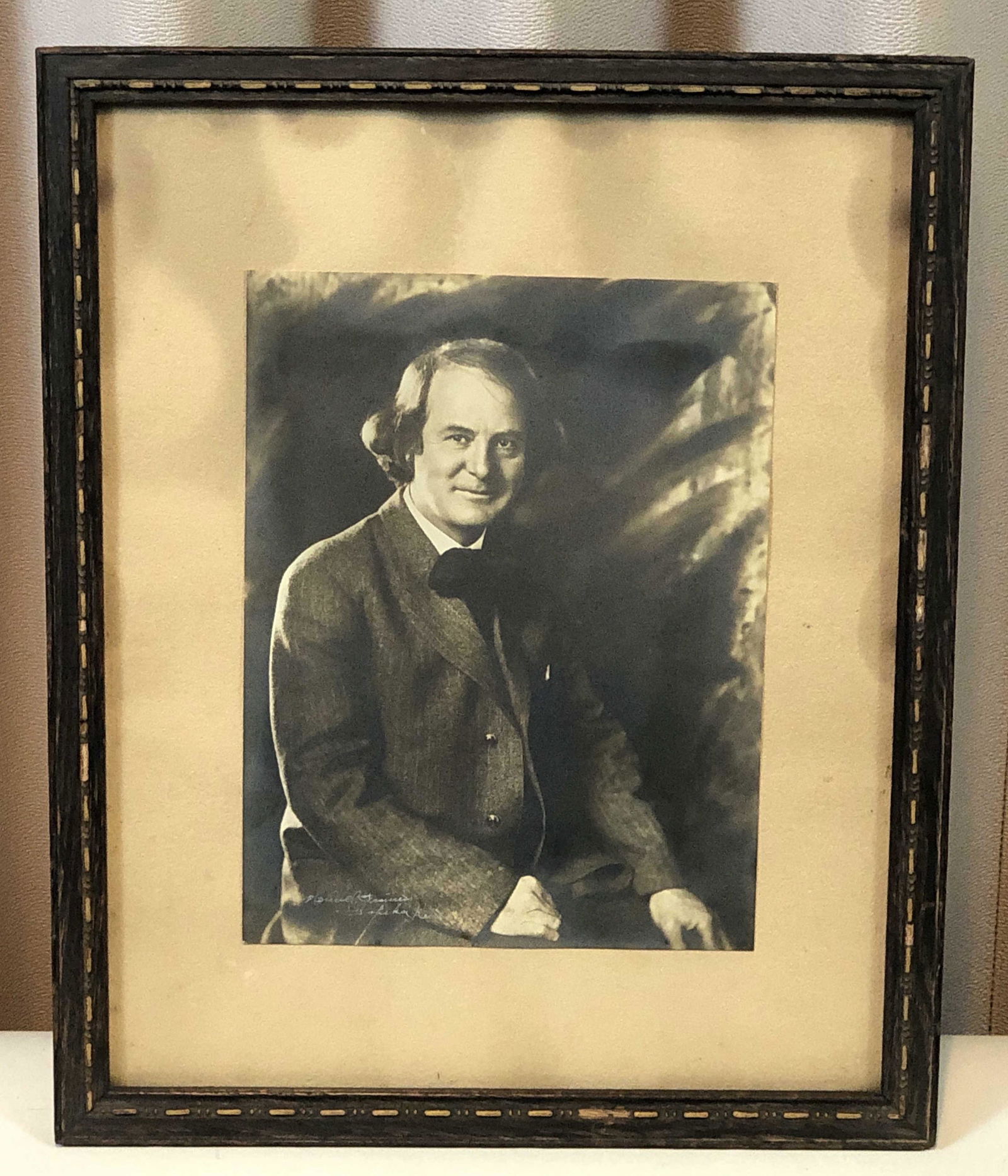 Photograph of Elbert Hubbard: Two unidentifiable signatures. Overall with frame 15 1/4" high x 12 1/4" wide. IMPORTANT: Before bidding, please read the terms and conditions. When you registered for the auction you agreed to these