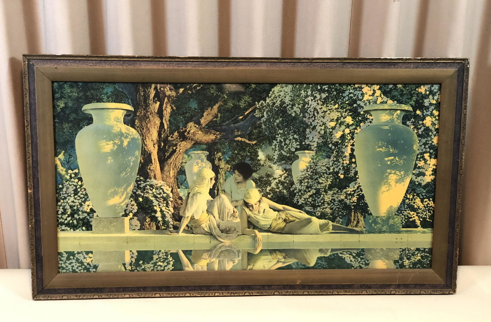 Maxfield Parrish Print: "The Garden of Allah." Overall with frame 19" high x 33 1/2" wide. Interior 14-3/4" high x 29-1/2" wide. IMPORTANT: Before bidding, please read the terms and conditions. When you registered for the au