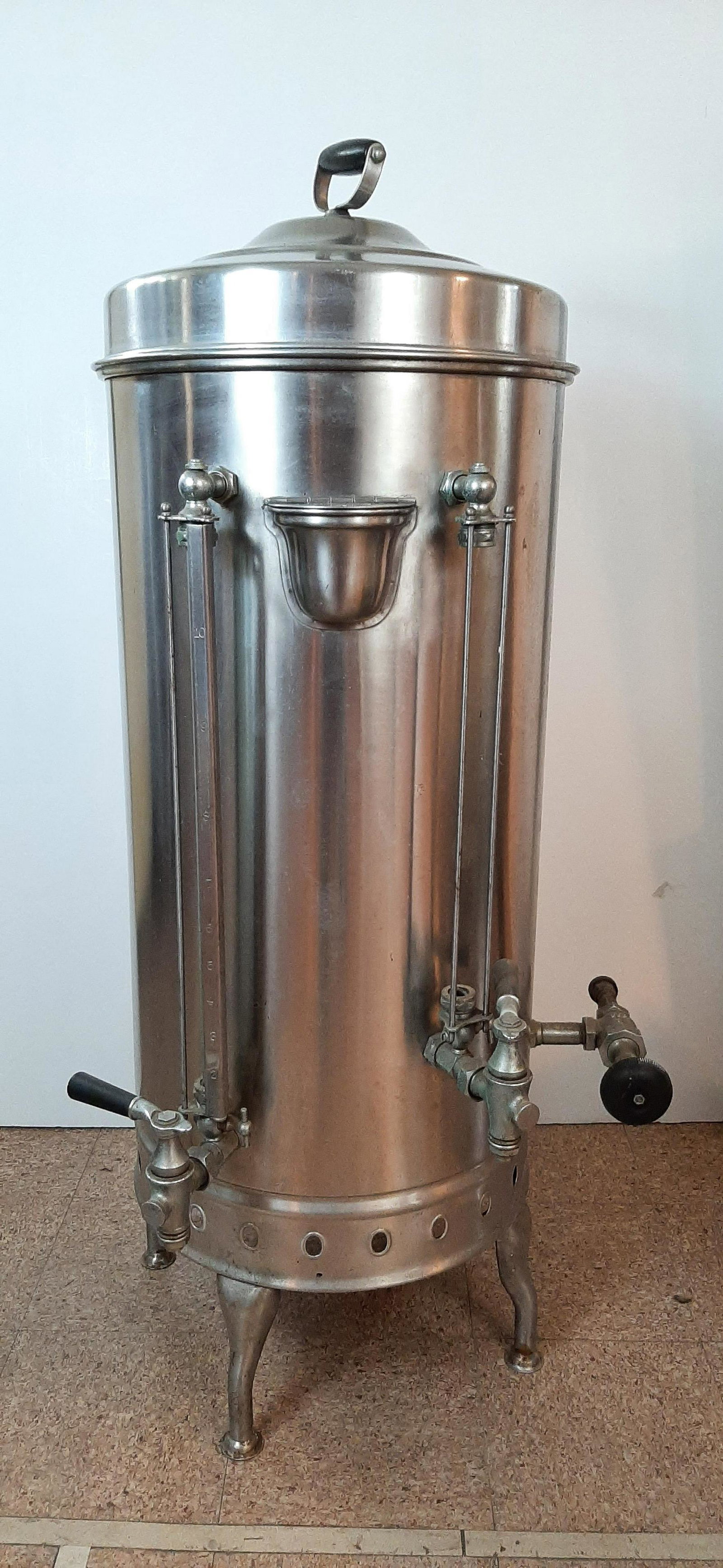 Hercules Stainless Steel Coffee Dispenser: 21" wide X 19" deep X 44" high. IMPORTANT: Before bidding, please read the terms and conditions. When you registered for the auction you agreed to these terms and will be required to comply with them.